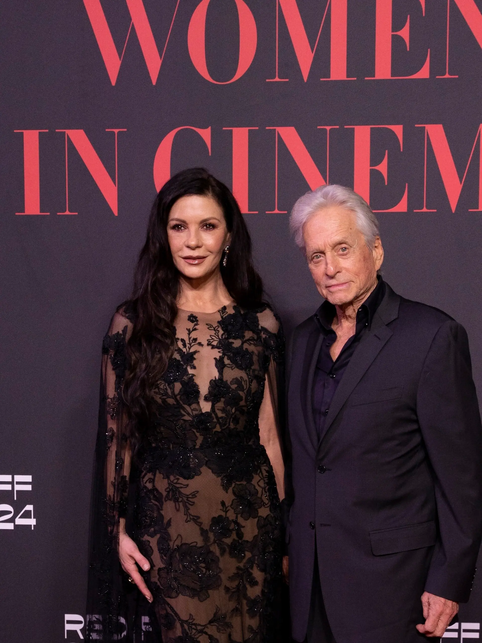Catherine Zeta-Jones and Michael Douglas pose for photographers upon arrival at the Women in Cinema event during the Red Sea International Film Festival in Jeddah, Saudi Arabia, Saturday, Dec. 7, 2024. (Photo by Joel C Ryan/Invision/AP)