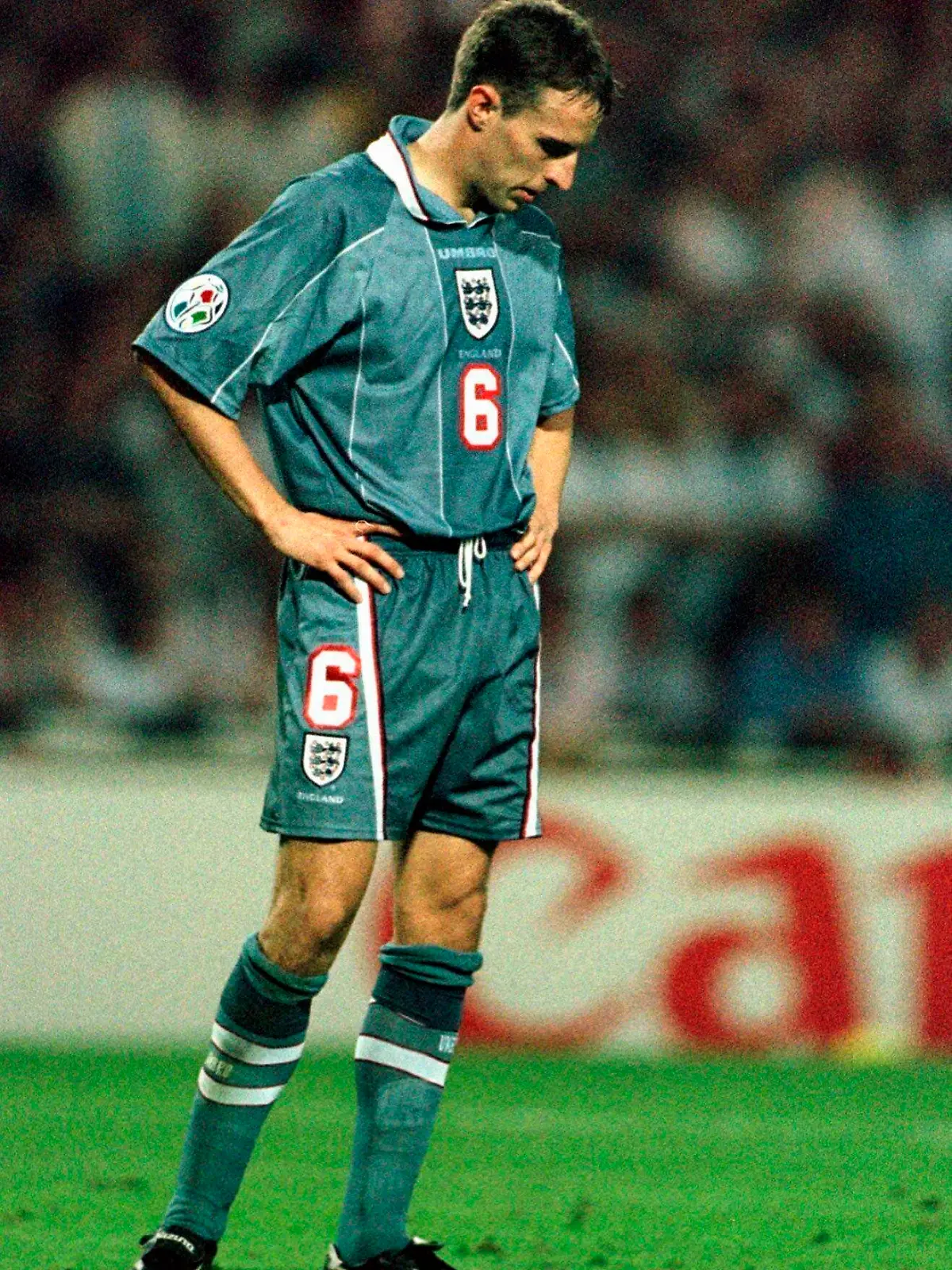 FILE - In this June 26, 1996 file photo England's Gareth Southgate bows his head after missing from the spot during a penalty shootout in the European Soccer Championships semi-final match against England at London's Wembley Stadium. Germany won 6-5 on penalties after the match finished 1-1 following extra time. Current England coach Gareth Southgate missed the decisive kick in the shootout, and Germany went on to win the title. (AP Photo/Lynne Sladky, File)