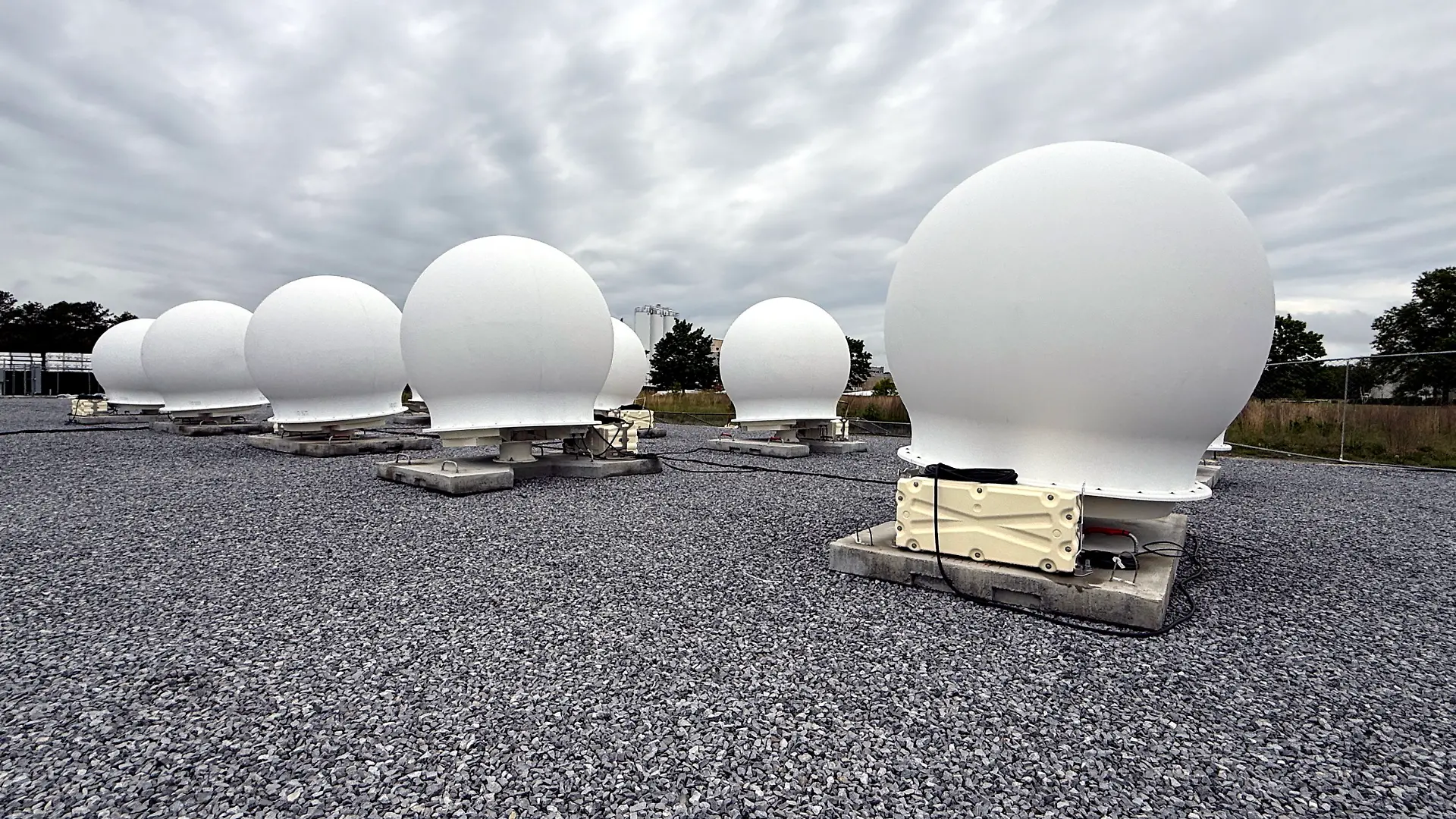 Calverton, N.Y.: Some of the 40 white orb earth satellite stations that were installed in Calverton, New York, and which can communicate with Starlink satellites in space, are seen on May 14, 2025. (Photo by James Carbone/Newsday RM via Getty Images)