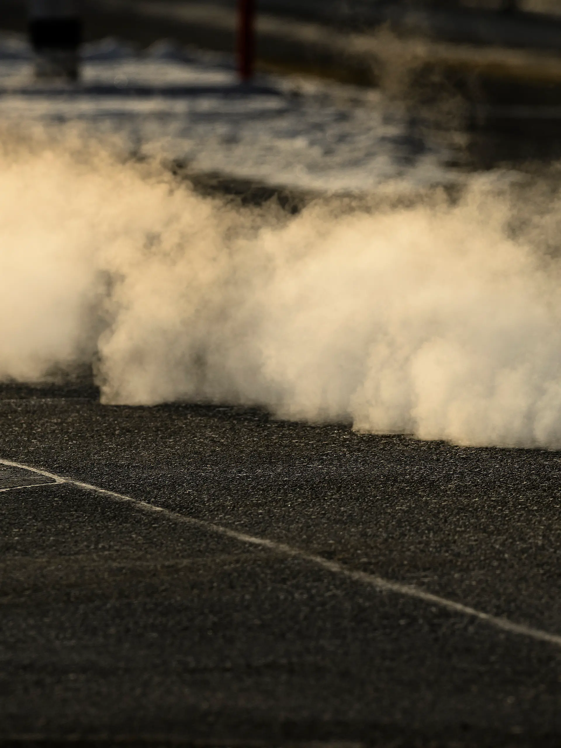 A car emits exhaust fumes into the air, photographed on Tuesday, January 6, 2026 in Bern.