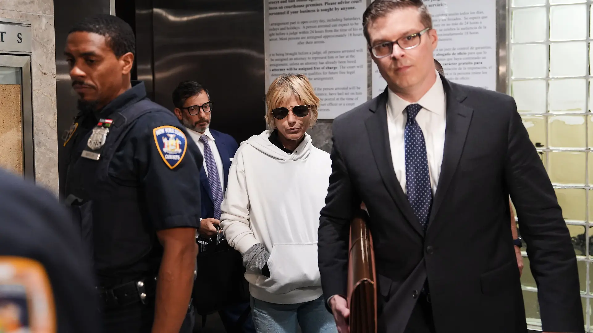 Selma Blair leaves court on Monday, Oct. 12, 2026, in New York after her arraignment on charges of injuring two flight attendants during a cross-country flight. (AP Photo/Ryan Murphy)