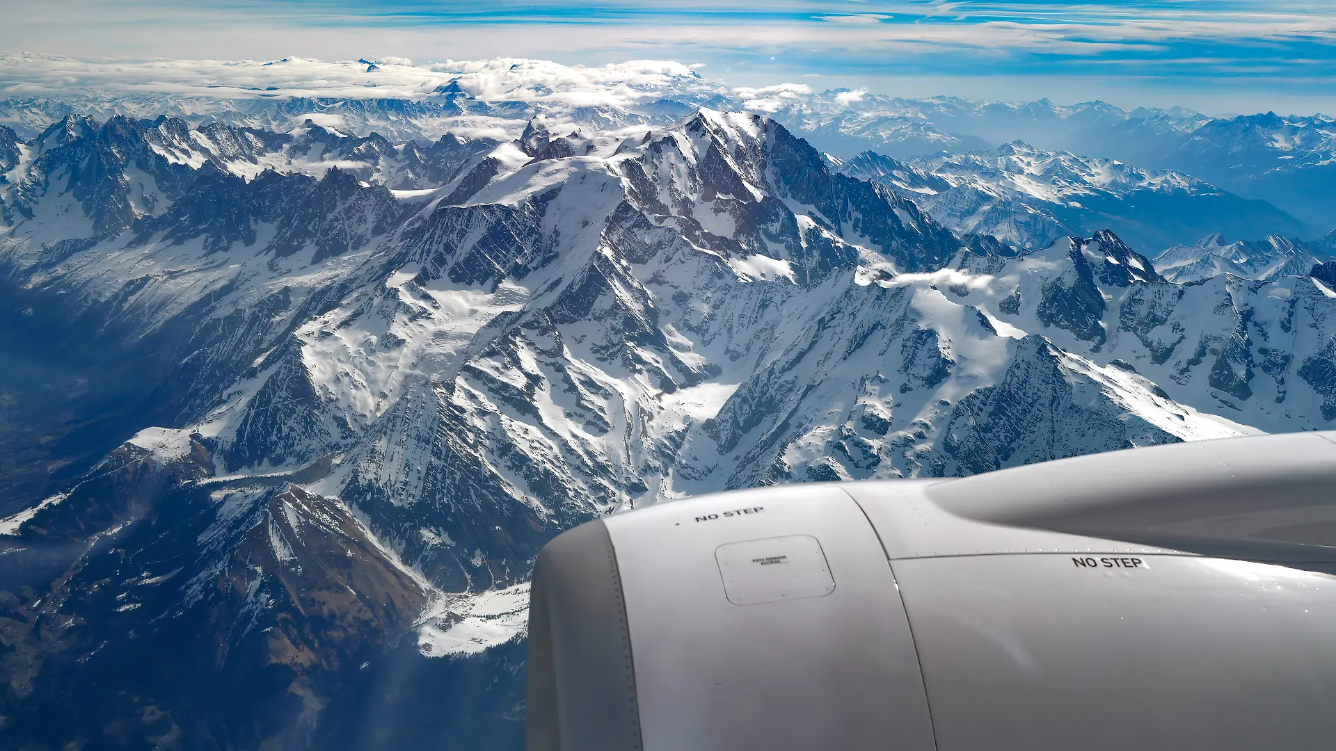 This photograph shows the Mont Blanc massif mountain range in the French Alps from an airplane on April 10, 2026. (Photo by Valery HACHE / AFP)