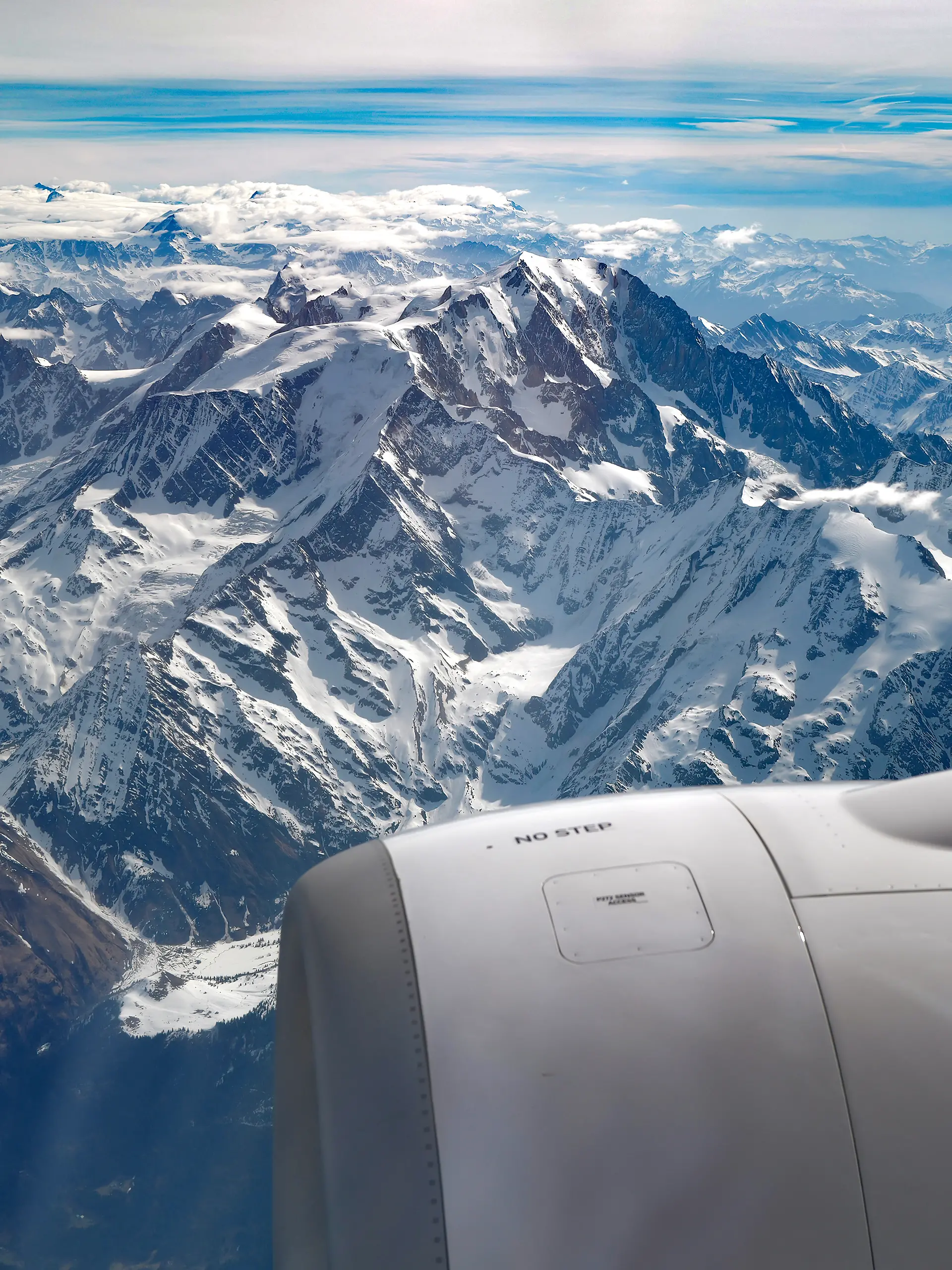 This photograph shows the Mont Blanc massif mountain range in the French Alps from an airplane on April 10, 2026. (Photo by Valery HACHE / AFP)