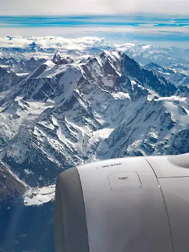 This photograph shows the Mont Blanc massif mountain range in the French Alps from an airplane on April 10, 2026. (Photo by Valery HACHE / AFP)