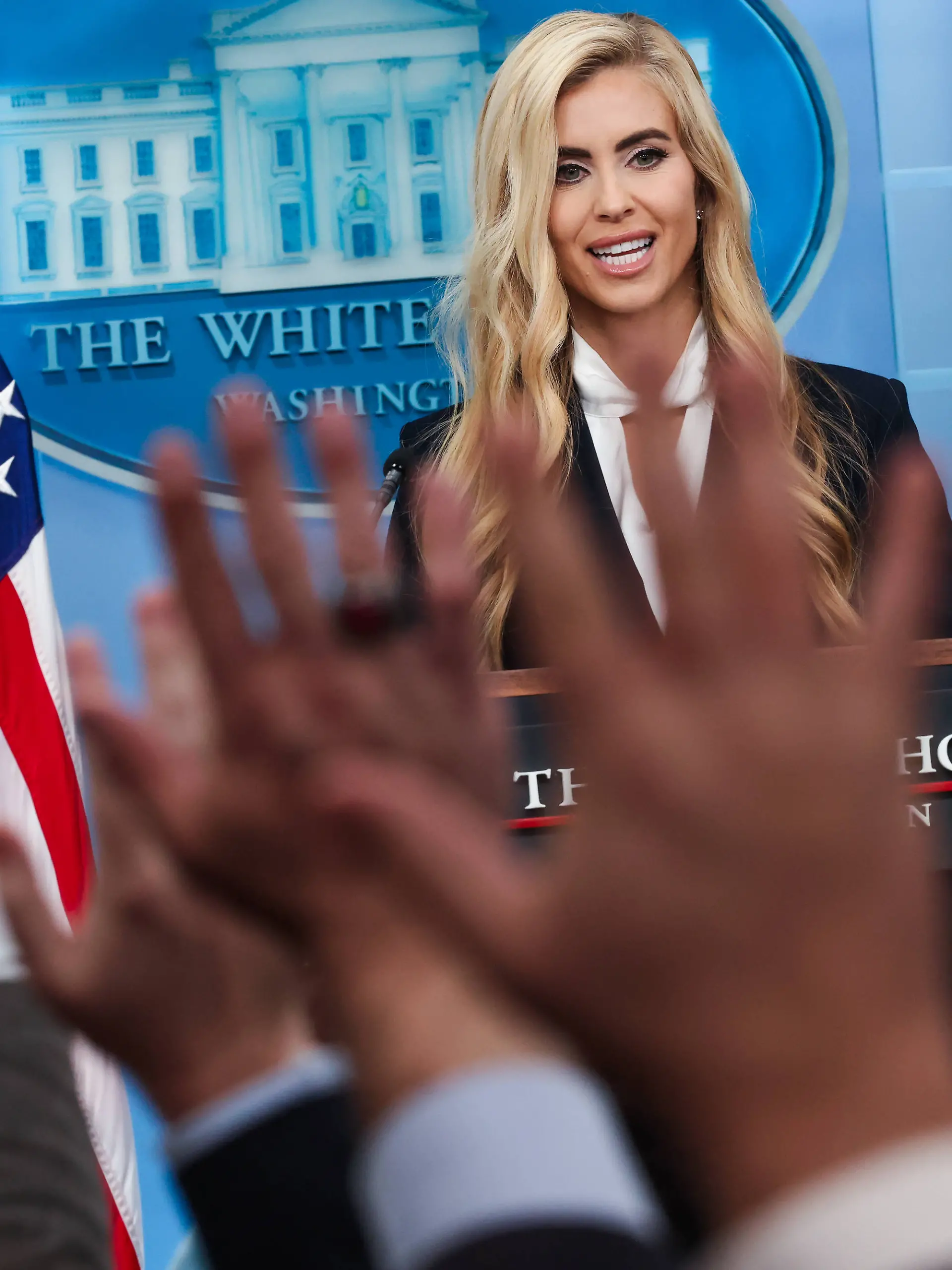 Reporters raise their hands as White House Press Secretary Katie Zacharia conducts her first press briefing in the James S Brady Press Briefing Room of the White House in Washington, DC, USA, on Tuesday, October 13, 2026. Copyright: xSamuelxCorum/PoolxviaxCNPx/MediaPunchx