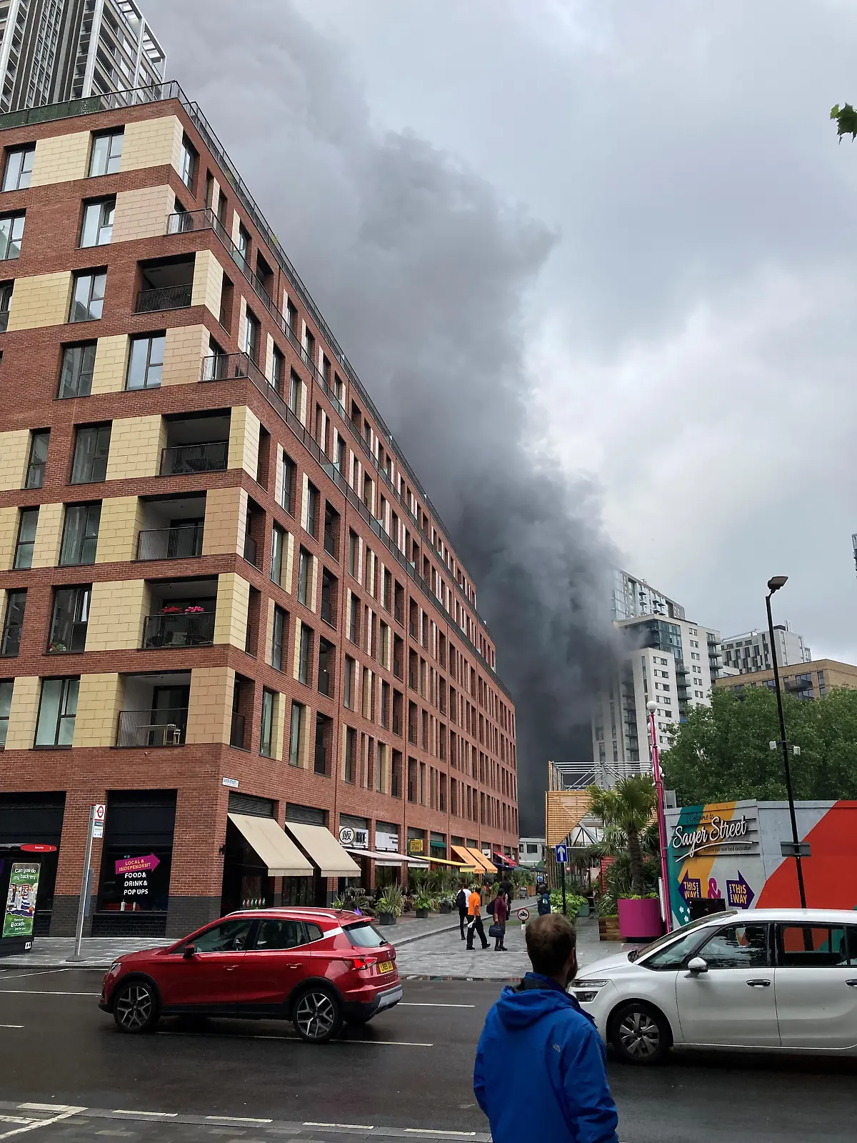 Smoke rises from the fire near Elephant and Castle station in London, Britain June 28, 2021 in this picture obtained from social media. Social media/via REUTERS THIS IMAGE HAS BEEN SUPPLIED BY A THIRD PARTY.