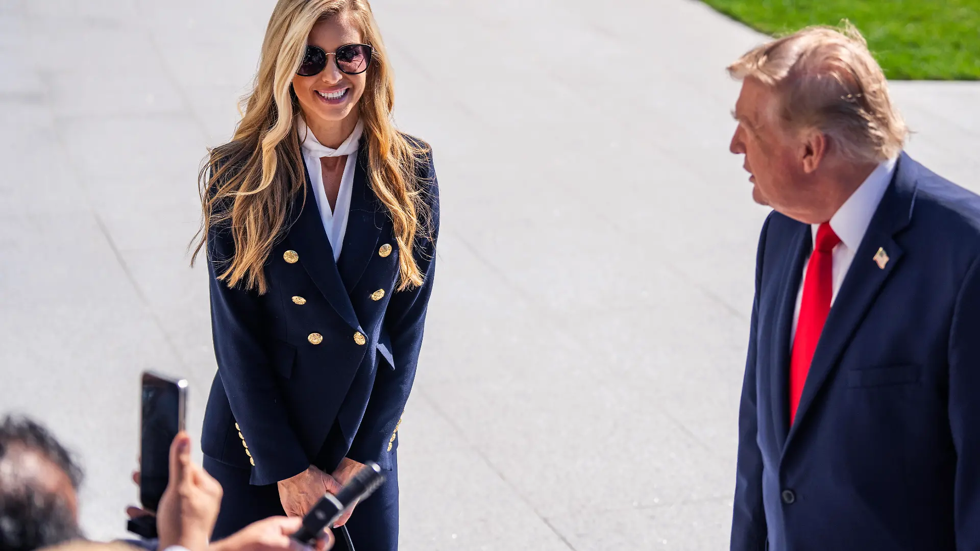 UNITED STATES - OCTOBER 13: President Donald Trump and White House Press Secretary Katie Zacharia talk with reporters on the South Lawn of the White House before boarding Marine One en route to Alaska on Tuesday, October 13, 2026. (Tom Williams/CQ Roll Call/Sipa USA)