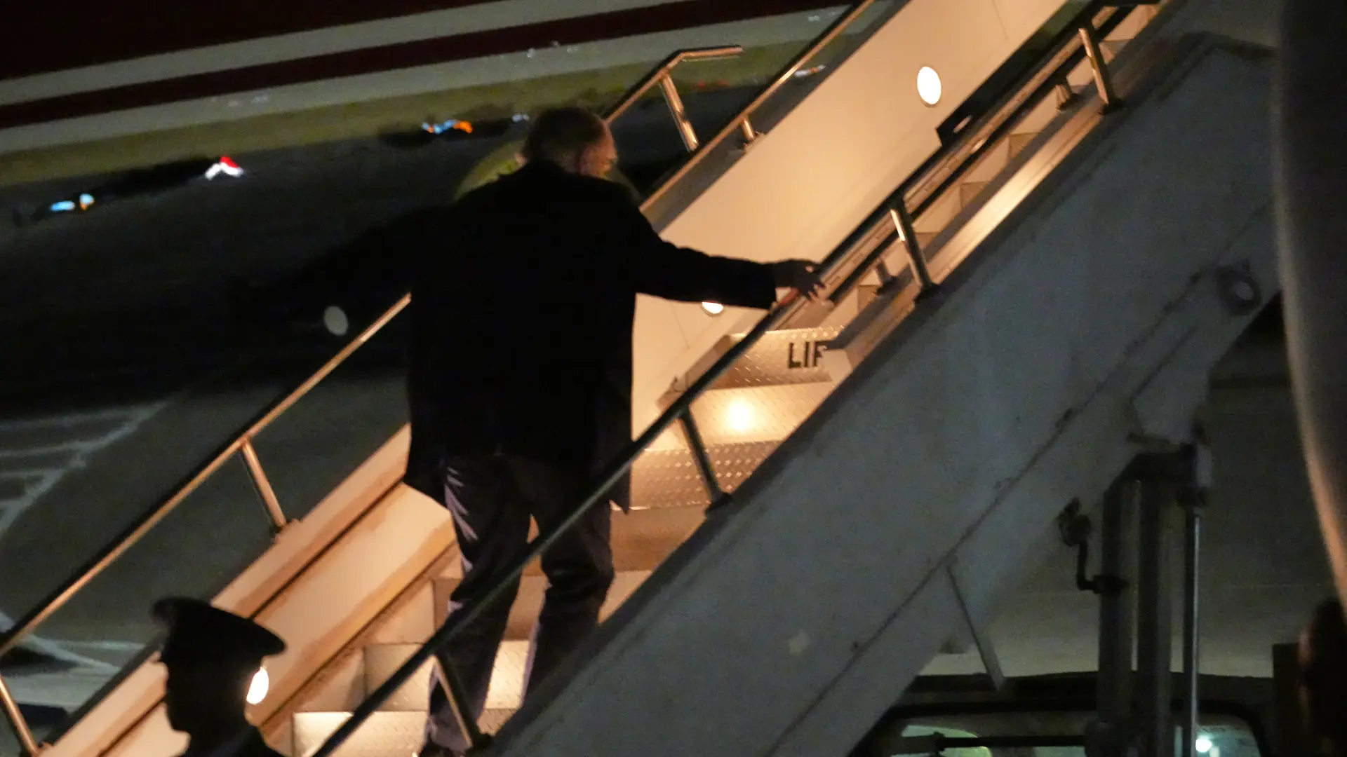 President Donald Trump boards Air Force One at McConnell Air Force Base, Monday, Oct. 19, 2026, in Wichita, Kan. (AP Photo/Julia Demaree Nikhinson)