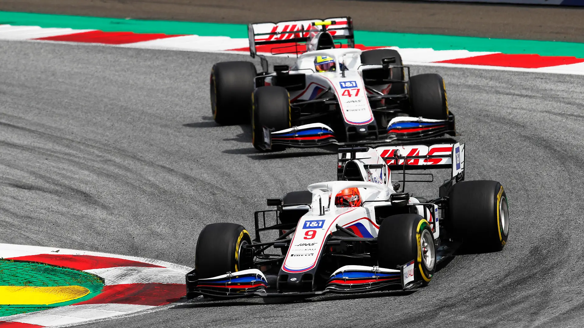 Formula 1 2021: Styrian GP RED BULL RING, AUSTRIA - JUNE 27: Nikita Mazepin, Haas VF-21, leads Mick Schumacher, Haas VF-21 during the Styrian GP at Red Bull Ring on Sunday June 27, 2021 in Spielberg, Austria. Photo by Zak Mauger / LAT Images Images PUBLICATIONxINxGERxSUIxAUTxHUNxONLY GP2108_130815_54I4445