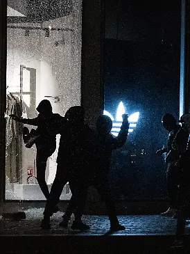 Rioters attempt to smash the windows of the Adidas store at Châtelet–Les Halles in Paris in an attempt to loot the shop, while security guards remain inside. Following the French President’s televised address at 8 p.m., spontaneous demonstrations broke out across Paris, leading to clashes between rioters and police. Paris, France, Sunday, October 18,
