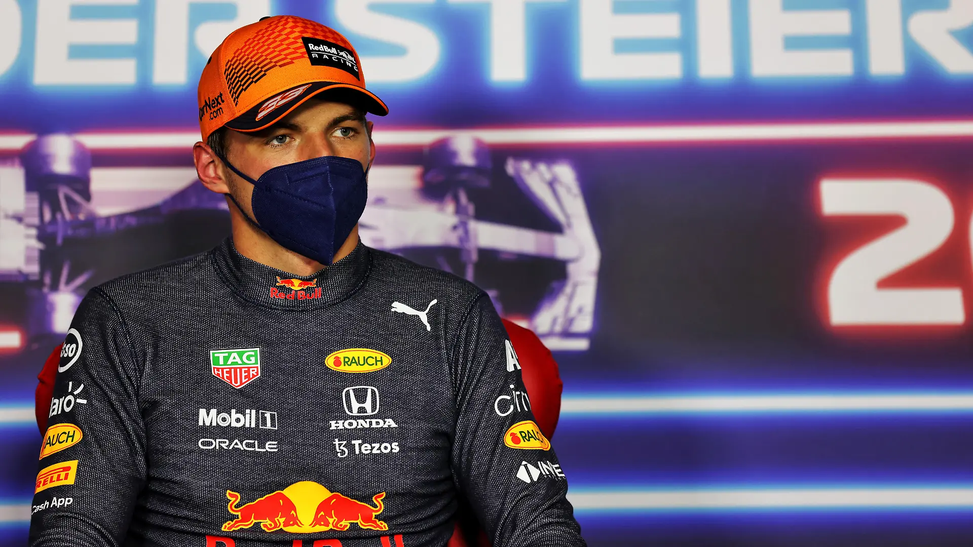 SPIELBERG, AUSTRIA - JUNE 26: Pole position qualifier Max Verstappen of Netherlands and Red Bull Racing talks in the press conference after qualifying ahead of the F1 Grand Prix of Styria at Red Bull Ring on June 26, 2021 in Spielberg, Austria. (Photo by Russell Batchelor - Pool/Getty Images)