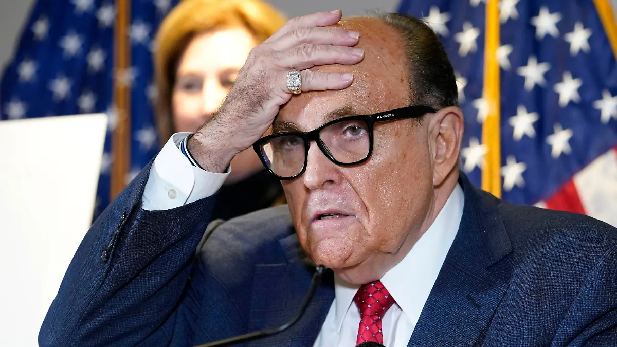 FILE - In this Nov. 19, 2020, file photo, former New York Mayor Rudy Giuliani, who was a lawyer for President Donald Trump, speaks during a news conference at the Republican National Committee headquarters in Washington. U.S. prosecutors in 2019 sought the electronic messages of two ex-Ukrainian government officials and a Ukrainian businessman as part of their probe of Rudolph Giuliani's dealings in that country, a lawyer accidentally revealed in a court filing Tuesday, May 25, 2021. The filing said federal prosecutors in New York had obtained an email account believed to belong to the former prosecutor general of Ukraine, Yuriy Lutsenko. (AP Photo/Jacquelyn Martin, File)
