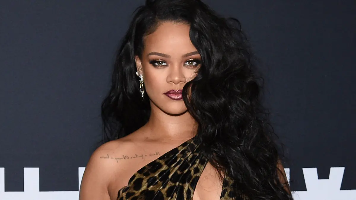 FILE - Singer and fashion designer Rihanna attends the "Rihanna" book launch event in New York on Oct. 11, 2019. Dozens of artists have objected to President Donald Trump using their music in his presidential campaigns. Rihanna demanded that Trump stop playing “Don't Stop the Music” after the song played at a 2018 rally. (Photo by Evan Agostini/Invision/AP, File)