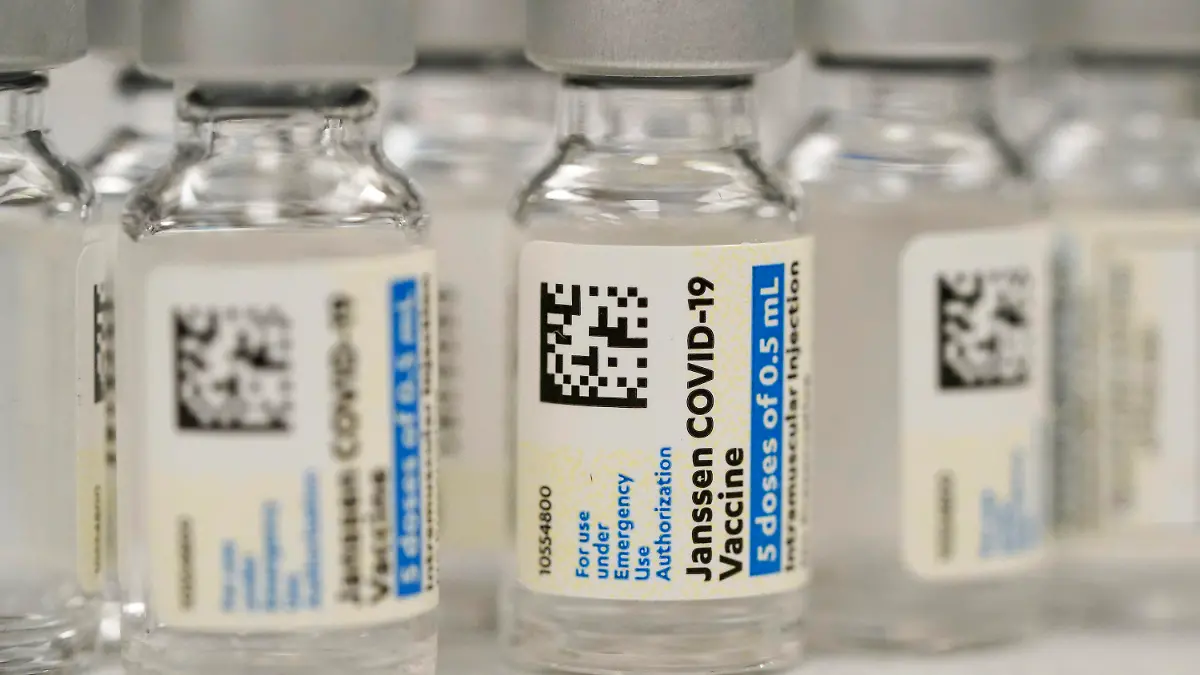 FILE - This Saturday, March 6, 2021 file photo shows vials of Johnson & Johnson COVID-19 vaccine at a pharmacy in Denver. Hundreds of thousands of COVID-19 vaccine doses have been saved from the trash after U.S. regulators extended their expiration date for a second time, part of a nationwide effort to salvage expiring shots to battle the nation's summer surge in infections. The Food and Drug Administration on Wednesday, July 28, 2021 sent a letter to shot maker Johnson & Johnson declaring that the doses remain safe and effective for at least six months when properly stored.(AP Photo/David Zalubowski, File)