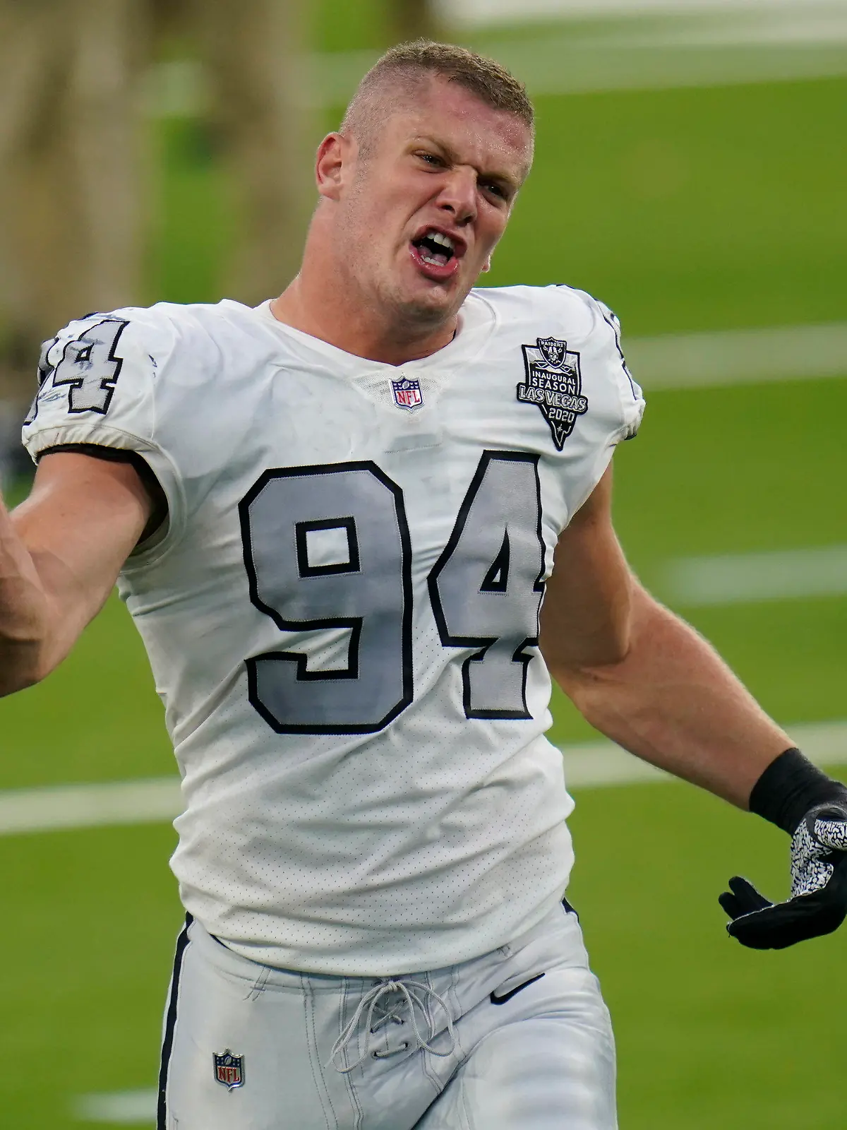 FILE - In this Nov. 8, 2020, file photo, Las Vegas Raiders defensive end Carl Nassib reacts after the Raiders defeated the Los Angeles Chargers in an NFL football game, in Inglewood, Calif. "To Carl Nassib and Kumi Yokoyama – two prominent, inspiring athletes who came out this week: I’m so proud of your courage. Because of you, countless kids around the world are seeing themselves in a new light today," U.S. President Joe Biden tweeted. Nassib is the first active NFL player to come out as gay. (AP Photo/Alex Gallardo, File)