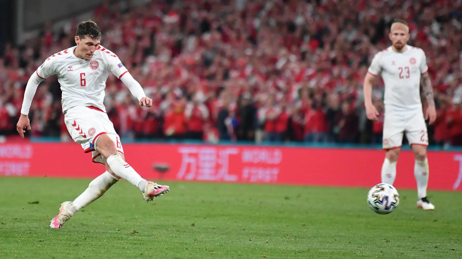 Denmark's Andreas Christensen scores his side's third goal during the Euro 2020 soccer championship group B match between Russia and Denmark at the Parken stadium in Copenhagen, Denmark, Monday, June 21, 2021. (Stuart Franklin/Pool via AP)