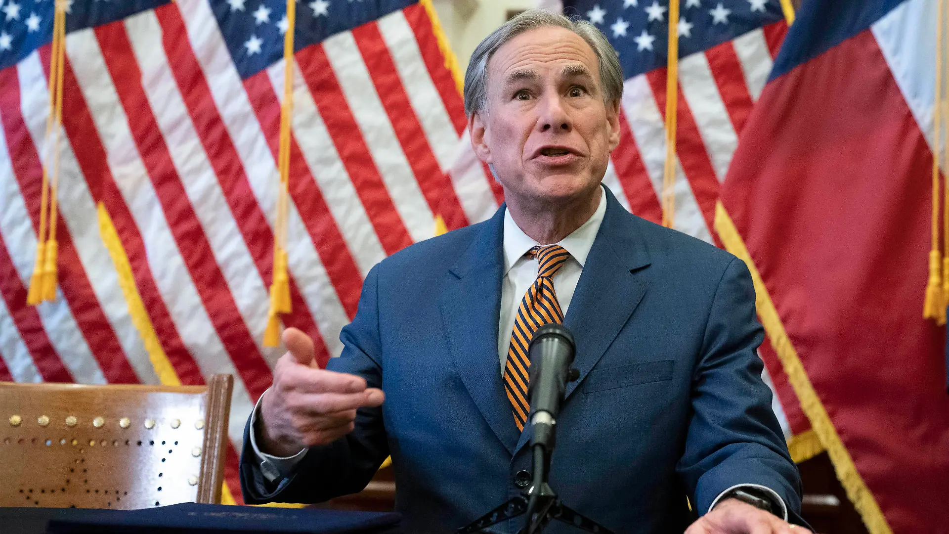 June 8, 2021, Austin, TX, United States: Texas Gov. GREG ABBOTT answers press questions after signing two bills strengthening the Texas power grid and infrastructure that were emergency items on his legislative agenda. The bills were in response to February s winter storm that nearly knocked out the Texas power grid. At left is Rep. CHRIS PADDIE , R-Marshall. Austin United States - ZUMAd150 20210608_znp_d150_026 Copyright: xBobxDaemmrichx