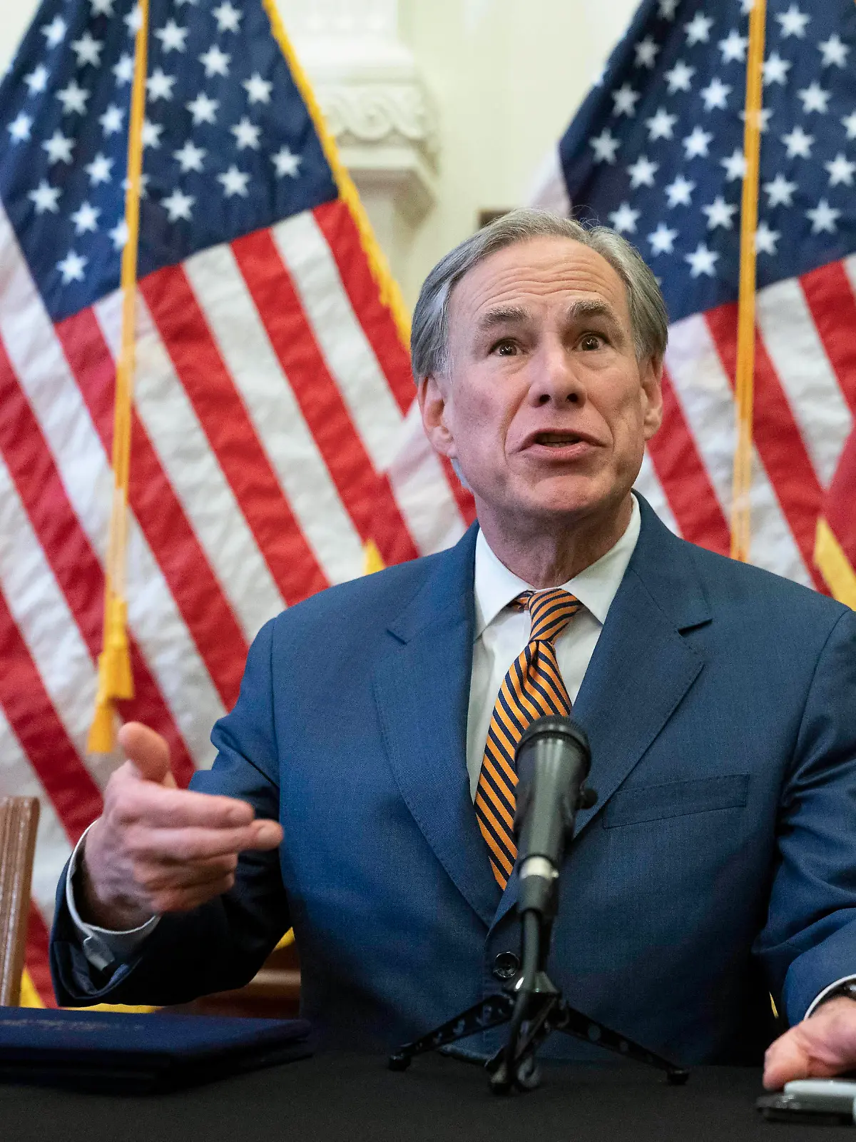June 8, 2021, Austin, TX, United States: Texas Gov. GREG ABBOTT answers press questions after signing two bills strengthening the Texas power grid and infrastructure that were emergency items on his legislative agenda. The bills were in response to February s winter storm that nearly knocked out the Texas power grid. At left is Rep. CHRIS PADDIE , R-Marshall. Austin United States - ZUMAd150 20210608_znp_d150_026 Copyright: xBobxDaemmrichx 