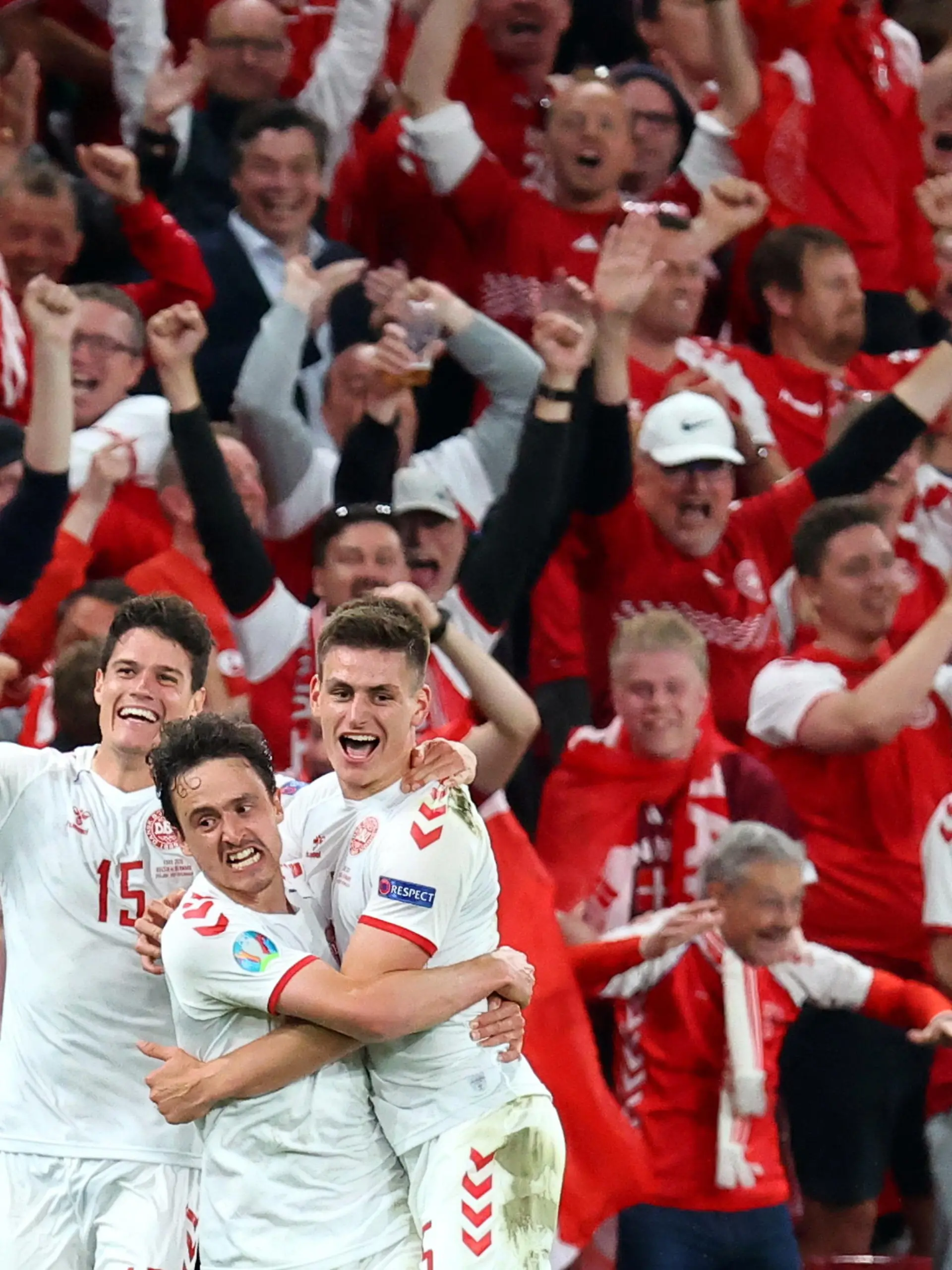 Soccer Football - Euro 2020 - Group B - Russia v Denmark - Parken Stadium, Copenhagen, Denmark - June 21, 2021 Denmark's Joakim Maehle celebrates scoring their fourth goal with Thomas Delaney and Christian Norgaard Pool via REUTERS/Wolfgang Rattay     TPX IMAGES OF THE DAY