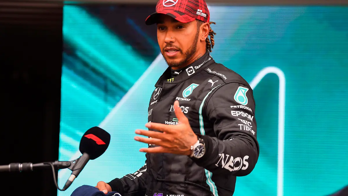 Mercedes driver Lewis Hamilton of Britain addresses the media after the qualifying session ahead of the French Formula One Grand Prix at the Paul Ricard racetrack in Le Castellet, southern France, Saturday, June 19, 2021. The French Grand Prix will be held on Sunday. (Nicolas Tucat/Pool via AP)