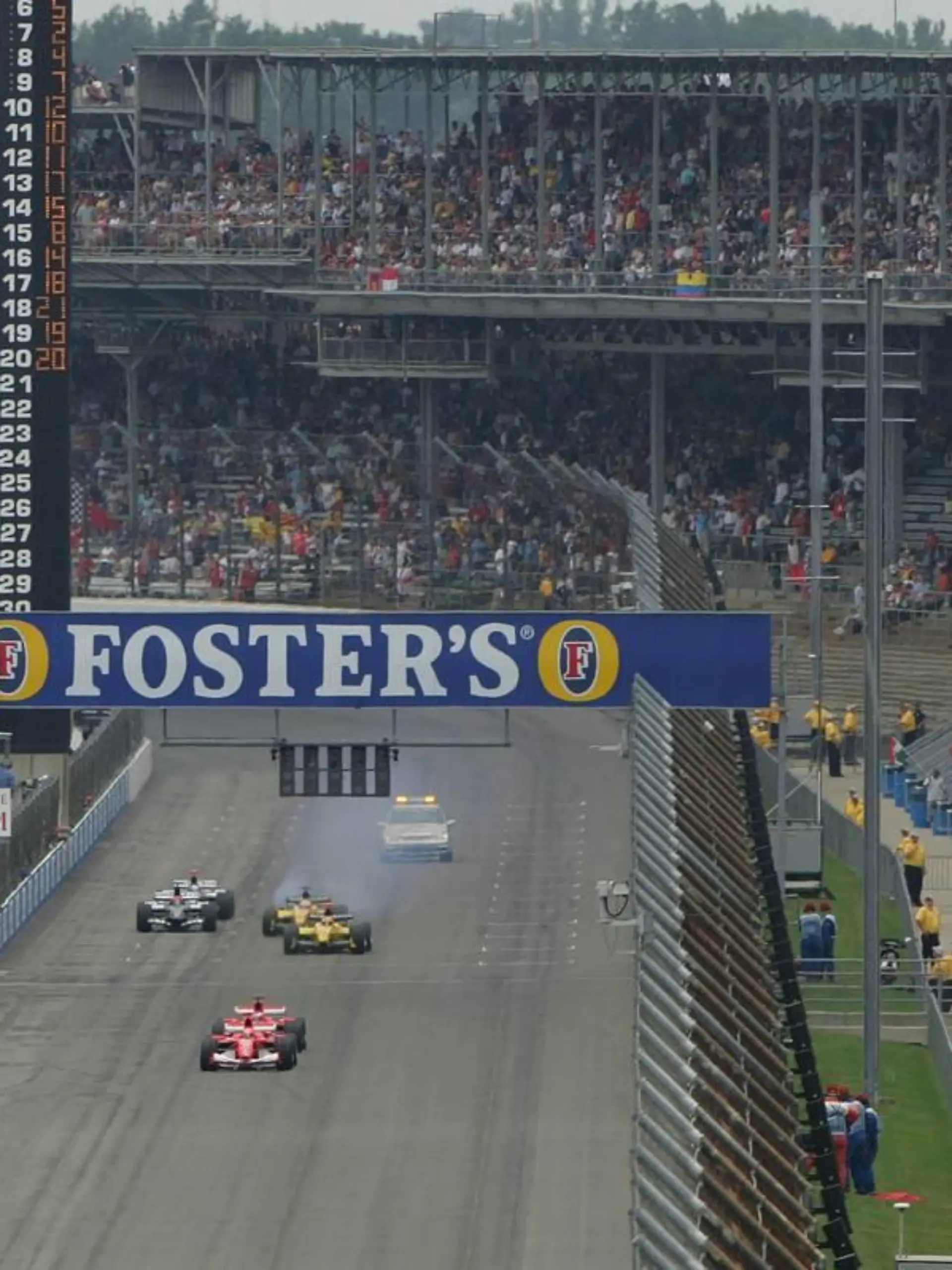 19.06.2005 Indianapolis, USA, Michael Schumacher, GER, Scuderia Ferrari Marlboro, F2005, Action, Track leads The Start of the race - June, Formula 1 World Championship, Rd 9, American Grand Prix, Indianapolis, USA, Race - www.xpb.cc, EMail: info@xpb.cc - copy of publication required for printed pictures. Every used picture is fee-liable. © Copyright:  xpb.cc