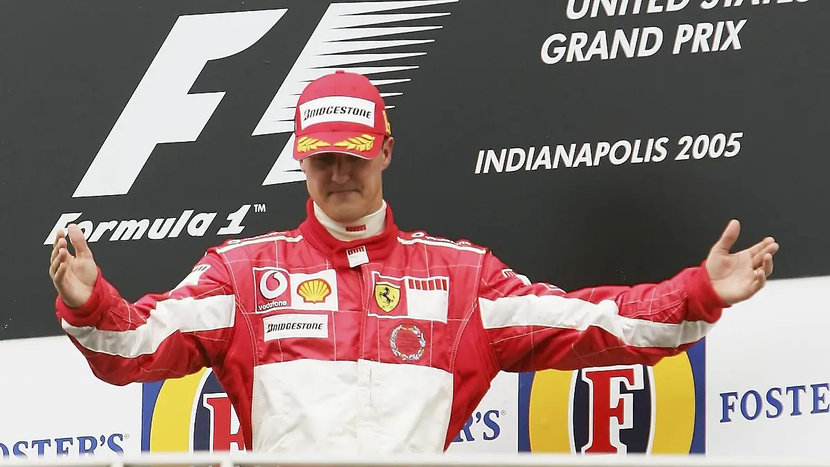 INDIANAPOLIS - JUNE 19: Michael Schumacher of Germany and Ferrari walks onto the victor's podium after the US F1 Grand Prix on June 19, 2005 in Indianapolis, Indiana. Only six drivers eventually competed in the race after the teams failed to resolve the Michelin tyre safety row. (Photo by Vladimir Rys/Bongarts/Getty Images) *** Local Caption *** Michael Schumacher