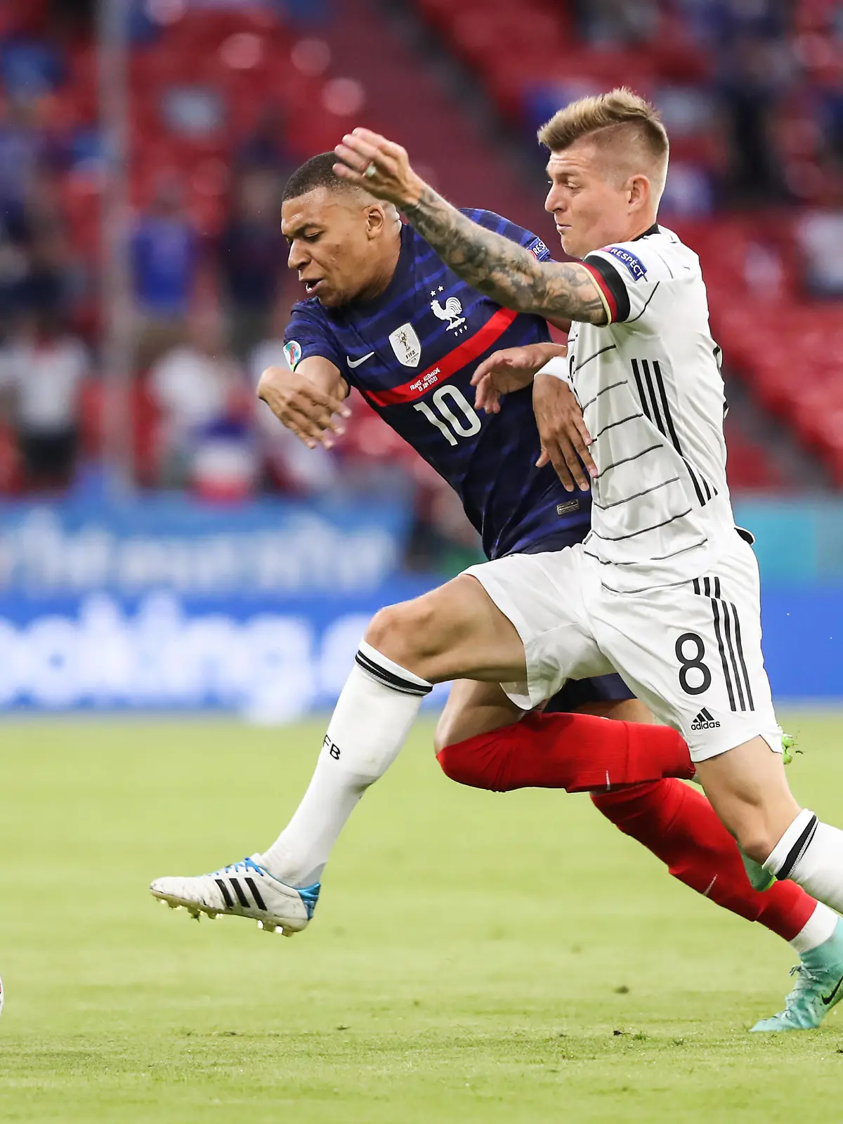 210616 -- MUNICH, June 16, 2021 -- Kylian Mbappe L of France vies with Toni Kroos of Germany during the UEFA EURO, EM, Europameisterschaft,Fussball 2020 Championship Group F match between France and Germany in Munich, Germany, June 15, 2021.  SPGERMANY-MUNICH-FOOTBALL-EURO 2020-FRA VS GER ShanxYuqi PUBLICATIONxNOTxINxCHN 