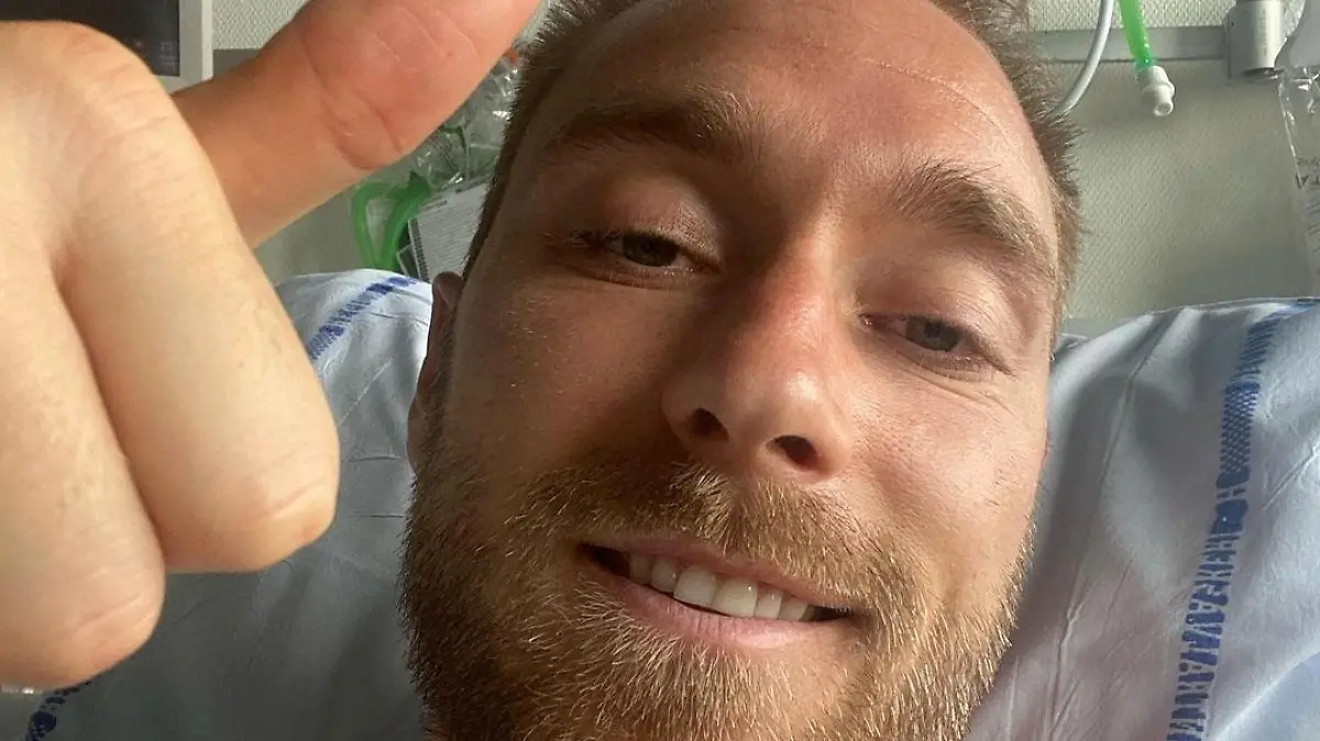 Danish footballer Christian Eriksen gives a thumbs-up at Rigshospitalet, where he is treated after he collapsed during a UEFA Euro 2020 game on Saturday, in Copenhagen, Denmark, in this picture obtained from social media. Picture published June 15, 2021. Danish Football Association/via REUTERS THIS IMAGE HAS BEEN SUPPLIED BY A THIRD PARTY. MANDATORY CREDIT. NO RESALES. NO ARCHIVES.