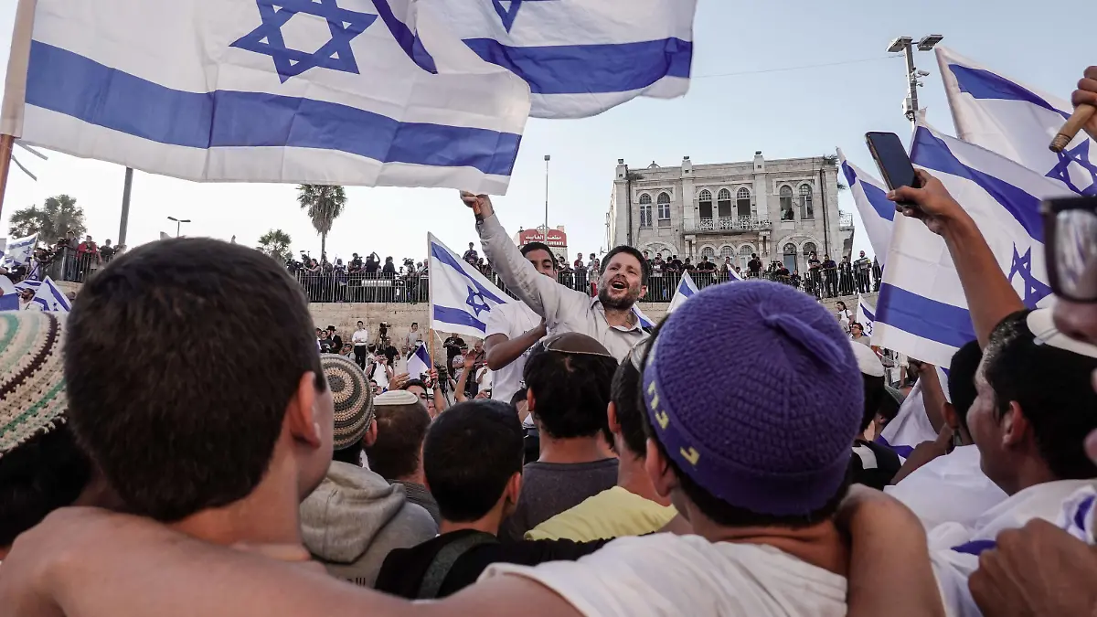 June 15, 2021, Jerusalem, Israel: Parliament Member BEZALEL SMICH of the Religious Zionism Party joins thousands identifying with the nationaloist religious Zionist streams marching in the annual Dance of Flags March from downtown Jerusalem to the Damascus Gate, Jaffa Gate and to the Western Wall. Participants celebrate the anniversary of the reunification of Jerusalem in the 1967 Six Day War in a demonstration of Jewish pride. Hamas Gaza threatened with rockets and the Palestinian Authority called for a day of rage in the West Bank in protest of what they consider a provocation in East Jerusalem. Jerusalem Israel - ZUMAa126 20210615_zap_a126_013 Copyright: xNirxAlonx