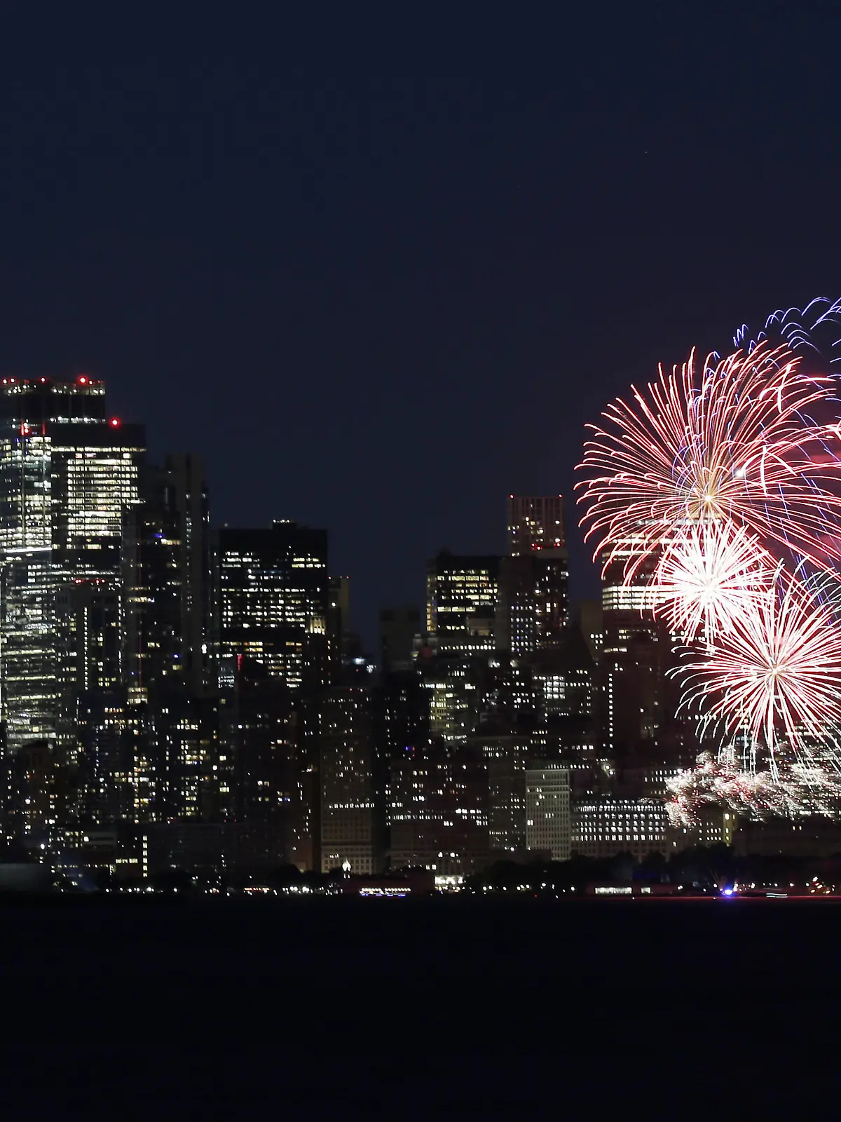  New York City puts on a fireworks show over the Statue Of Liberty and the Manhattan skyline after New York Gov. Andrew Cuomo announces that New York State has officially lifted all COVID restrictions and lockdowns in Bayonne, New Jersey on Tuesday, June 15, 2021. PUBLICATIONxINxGERxSUIxAUTxHUNxONLY NYP20210615132 JohnxAngelillo