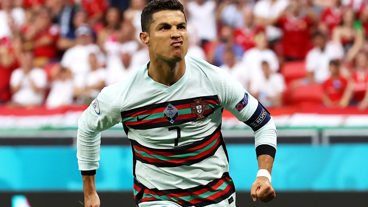 BUDAPEST, HUNGARY - JUNE 15: Cristiano Ronaldo of Portugal celebrates after scoring their side's second goal during the UEFA Euro 2020 Championship Group F match between Hungary and Portugal at Puskas Arena on June 15, 2021 in Budapest, Hungary. (Photo by Bernadett Szabo - Pool/Getty Images) ***BESTPIX***