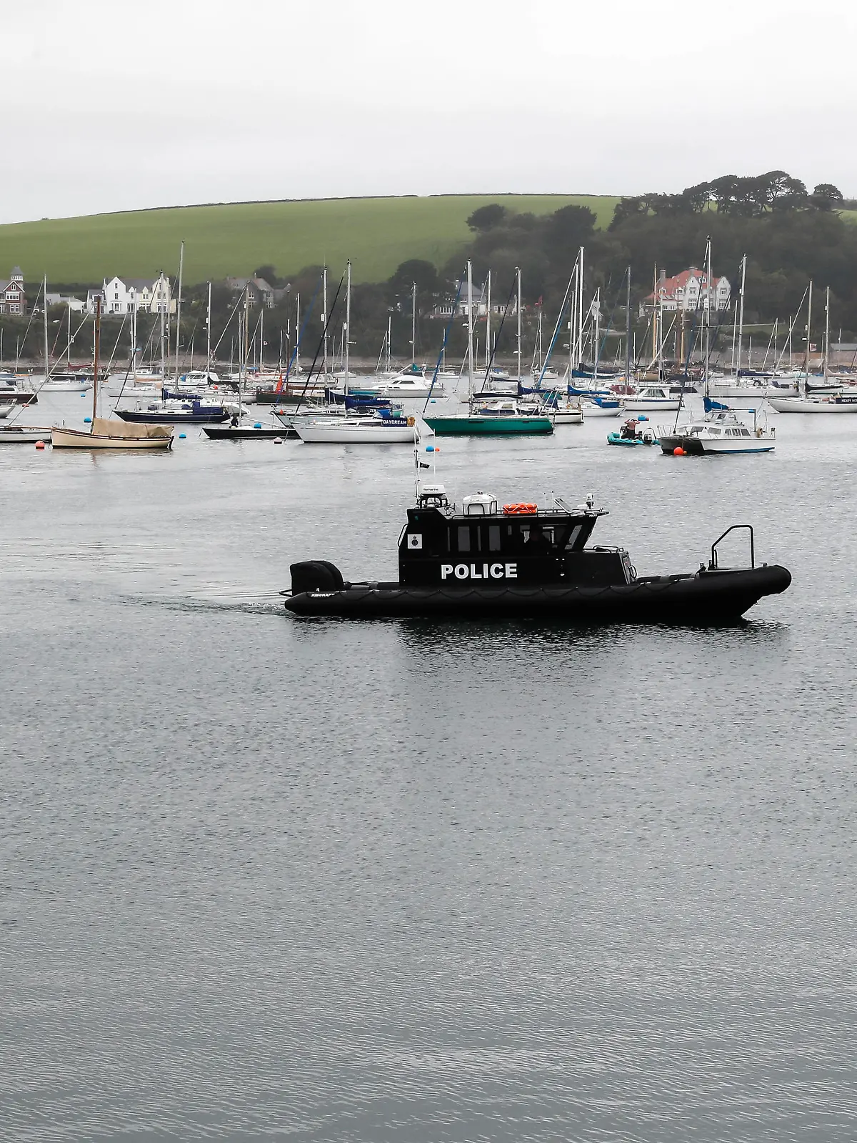 210613 -- CORNWALL, June 13, 2021 -- A police boat patrols in Falmouth, Cornwall, Britain, on June 11, 2021. TO GO WITH XINHUA HEADLINES OF JUNE 13, 2021  BRITAIN-CORNWALL-G7 SUMMIT HanxYan PUBLICATIONxNOTxINxCHN 
