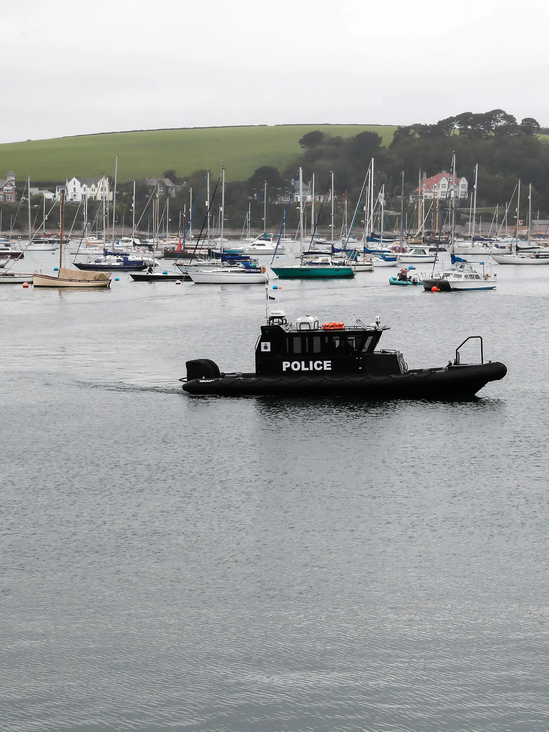 210613 -- CORNWALL, June 13, 2021 -- A police boat patrols in Falmouth, Cornwall, Britain, on June 11, 2021. TO GO WITH XINHUA HEADLINES OF JUNE 13, 2021  BRITAIN-CORNWALL-G7 SUMMIT HanxYan PUBLICATIONxNOTxINxCHN 