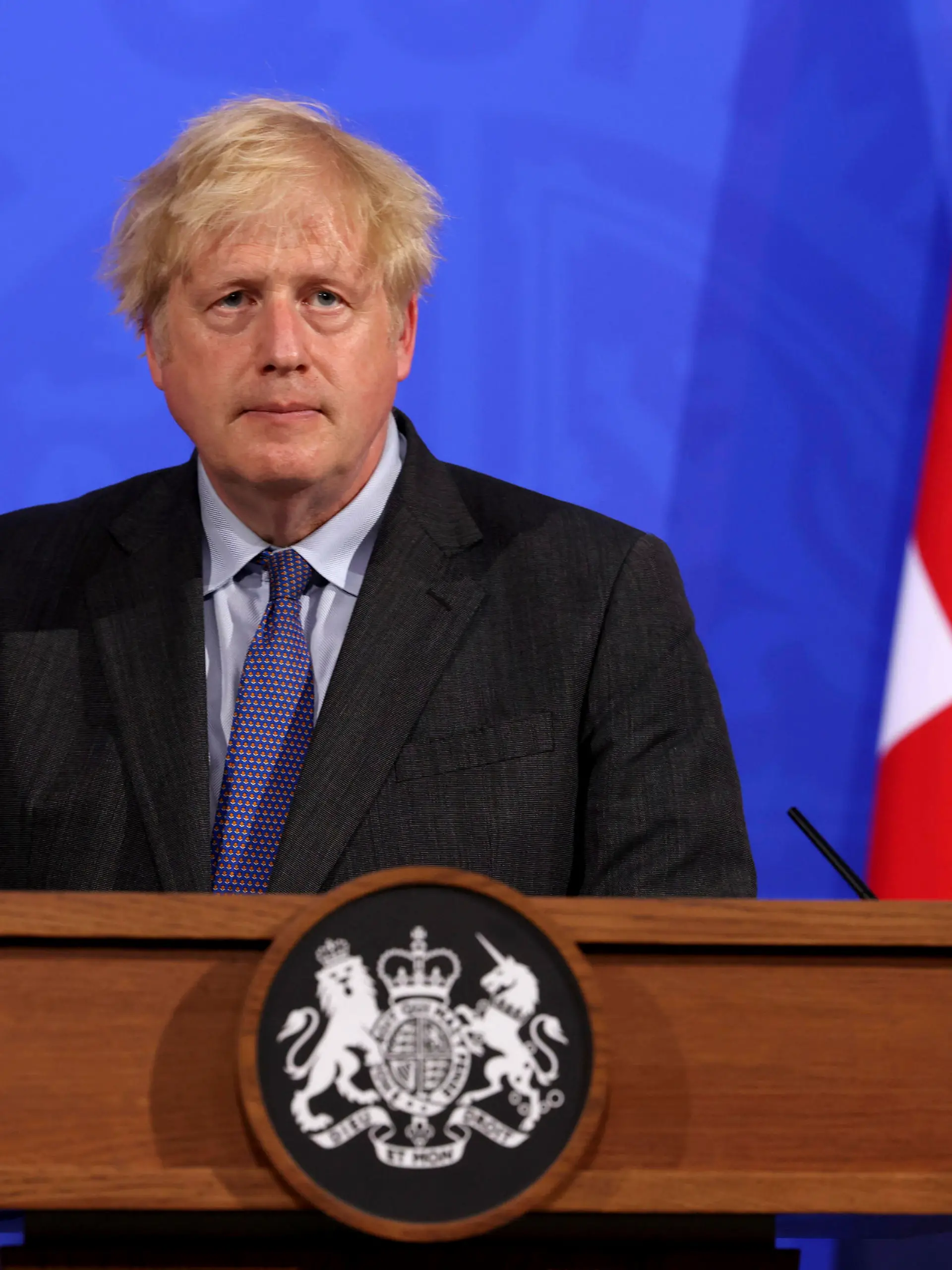 Britain's Prime Minister Boris Johnson attends a media briefing in Downing Street, London, Monday, June 14, 2021. Johnson has confirmed that the next planned relaxation of coronavirus restrictions in England will be delayed by four weeks until July 19 as a result of the spread of the delta variant. In a press briefing Monday, Johnson said he is “confident that we won’t need more than four weeks” as millions more people get fully vaccinated against the virus, which could save thousands of lives. (Jonathan Buckmaster/Pool Photo via AP)