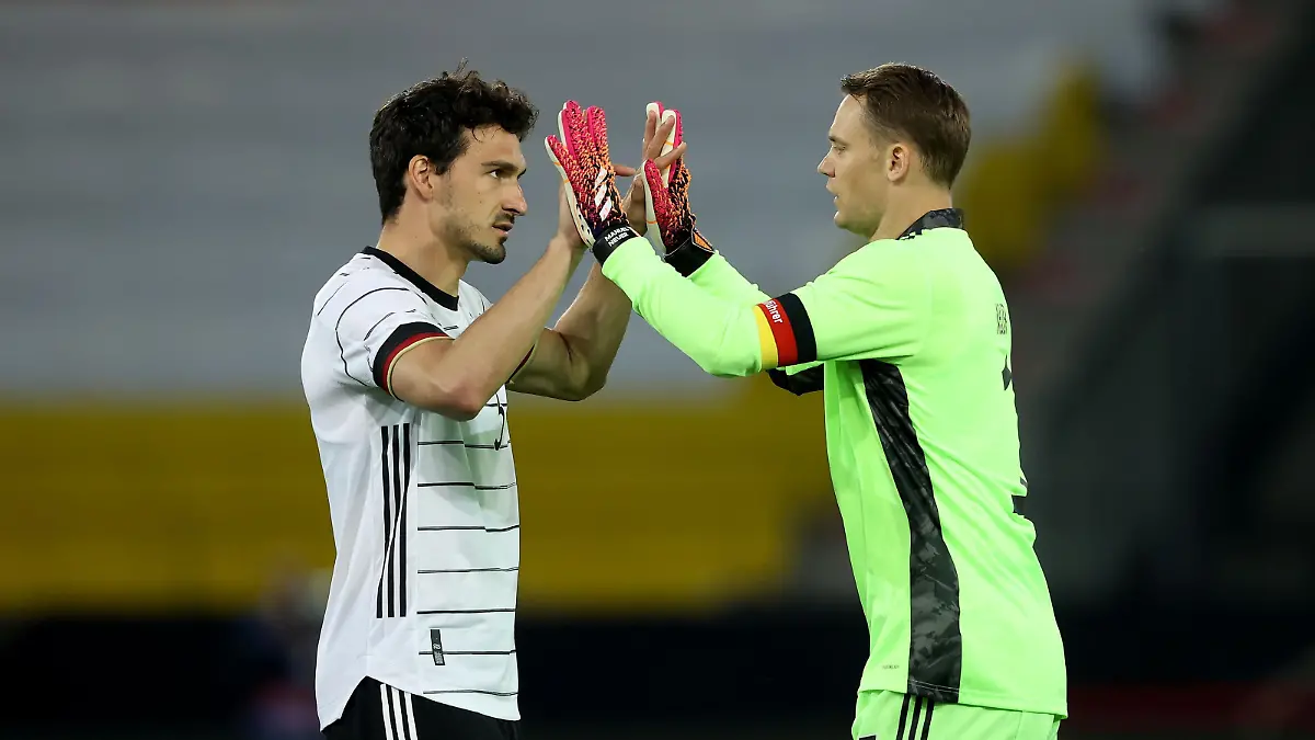 INNSBRUCK, AUSTRIA - JUNE 02: Manuel Neuer of Germany reacts with his team mate Mats Hummels during the international friendly match between Germany and Denmark at Tivoli Stadion on June 02, 2021 in Innsbruck, Austria. (Photo by Alexander Hassenstein/Getty Images)