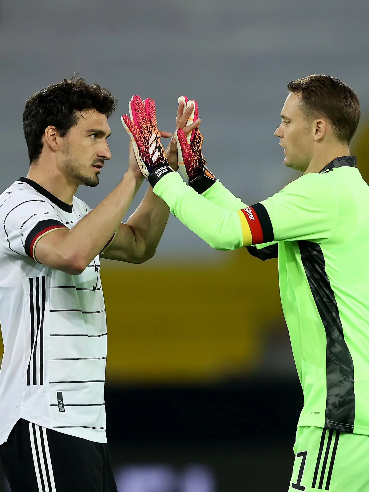 INNSBRUCK, AUSTRIA - JUNE 02: Manuel Neuer of Germany reacts with his team mate Mats Hummels during the international friendly match between Germany and Denmark at Tivoli Stadion on June 02, 2021 in Innsbruck, Austria. (Photo by Alexander Hassenstein/Getty Images)