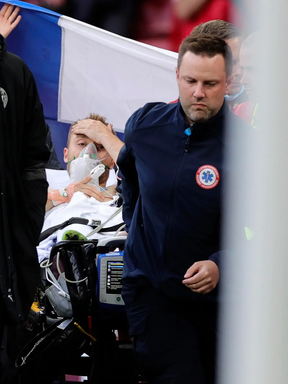 Paramedics using a stretcher to take out of the pitch Denmark's Christian Eriksen after he collapsed during the Euro 2020 soccer championship group B match between Denmark and Finland at Parken stadium in Copenhagen, Denmark, Saturday, June 12, 2021
