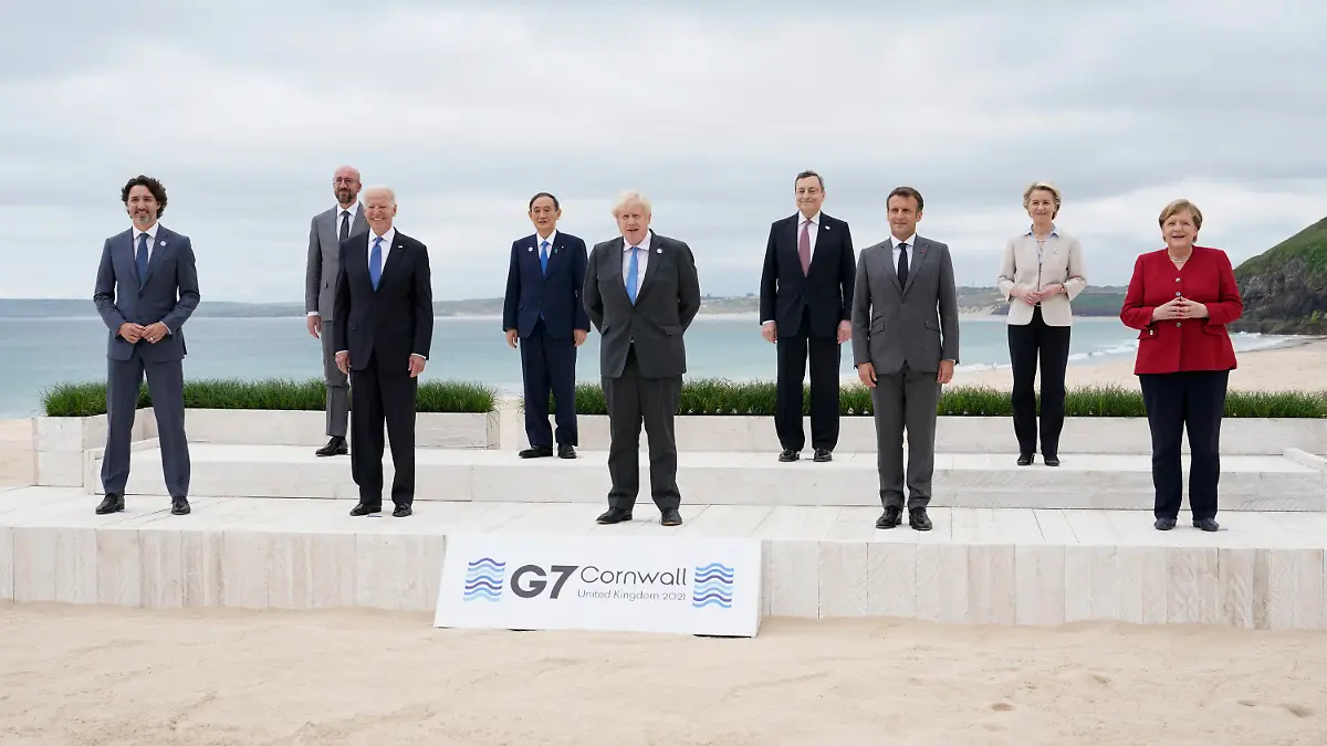 Leaders of the G7 pose for a group photo on overlooking the beach at the Carbis Bay Hotel in Carbis Bay, St. Ives, Cornwall, England, Friday, June 11, 2021. Leaders from left, Canadian Prime Minister Justin Trudeau, European Council President Charles Michel, U.S. President Joe Biden, Japan's Prime Minister Yoshihide Suga, British Prime Minister Boris Johnson, Italy's Prime Minister Mario Draghi, French President Emmanuel Macron, European Commission President Ursula von der Leyen and German Chancellor Angela Merkel. (AP Photo/Patrick Semansky, Pool)