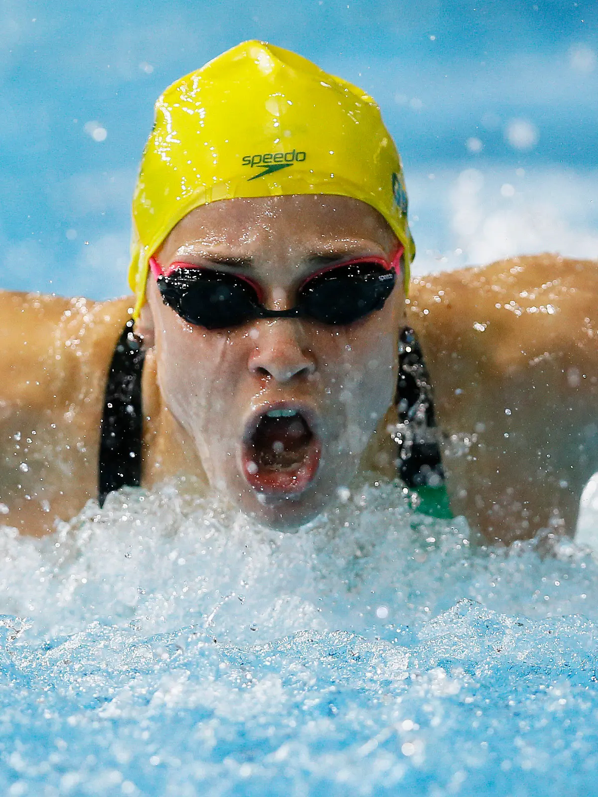 FILE - In this July 28, 2014, file photo, Maddie Groves of Australia swims to win silver in the Women's 200m Butterfly final at the Tollcross International Swimming Centre during the Commonwealth Games 2014 in Glasgow, Scotland. Cody Simpson was dominating attention ahead of Australia’s Olympic swimming trials, until Groves pulled out of the six-day meet following a series of social media posts condemning “misogynistic perverts” in the sport. (AP Photo/Kirsty Wigglesworth, File)