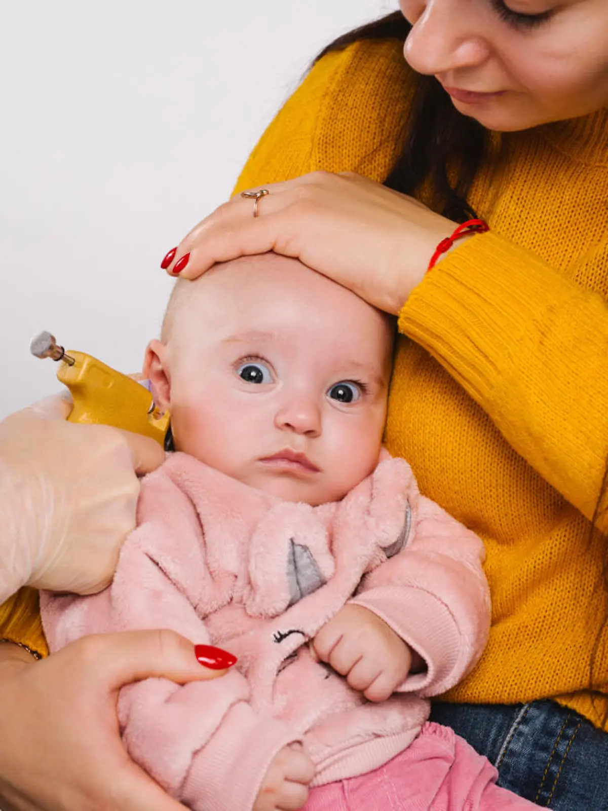 Ohrlöcher schon als Baby