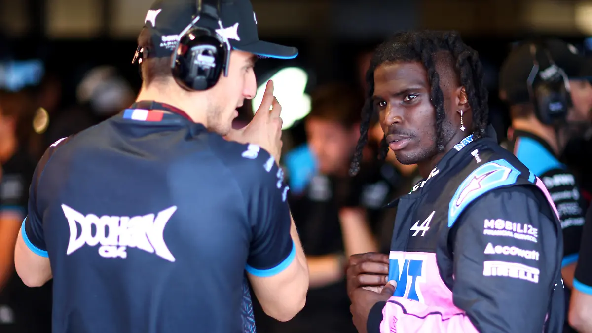 MIAMI, FLORIDA - MAY 05: Tyreek Hill of the Miami Dolphins speaks with Jack Doohan of Australia and Alpine F1 in the Alpine garage during practice ahead of the F1 Grand Prix of Miami at Miami International Autodrome on May 05, 2023 in Miami, Florida. (Photo by Dan Istitene - Formula 1/Formula 1 via Getty Images)