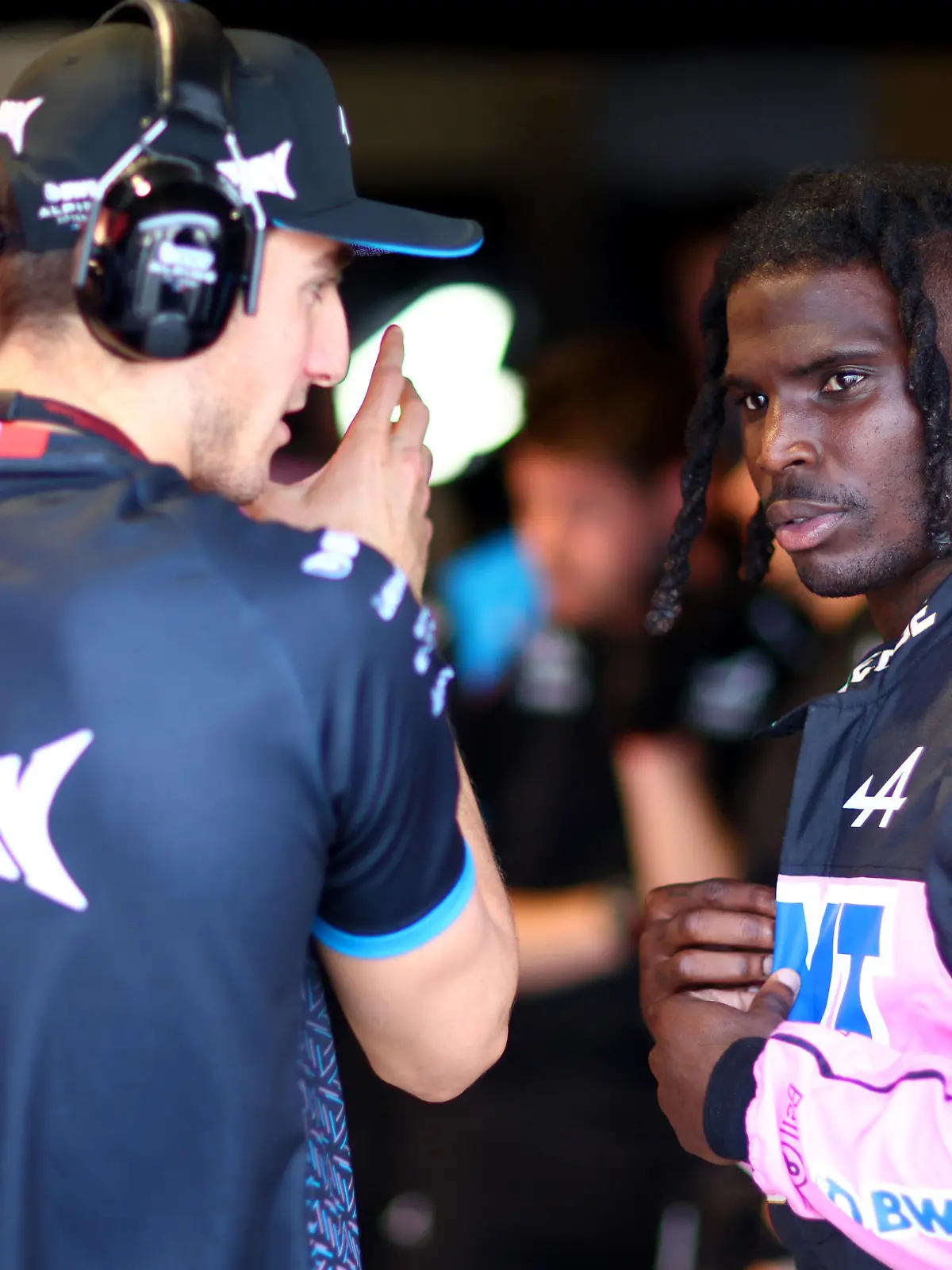 MIAMI, FLORIDA - MAY 05: Tyreek Hill of the Miami Dolphins speaks with Jack Doohan of Australia and Alpine F1 in the Alpine garage during practice ahead of the F1 Grand Prix of Miami at Miami International Autodrome on May 05, 2023 in Miami, Florida. (Photo by Dan Istitene - Formula 1/Formula 1 via Getty Images)