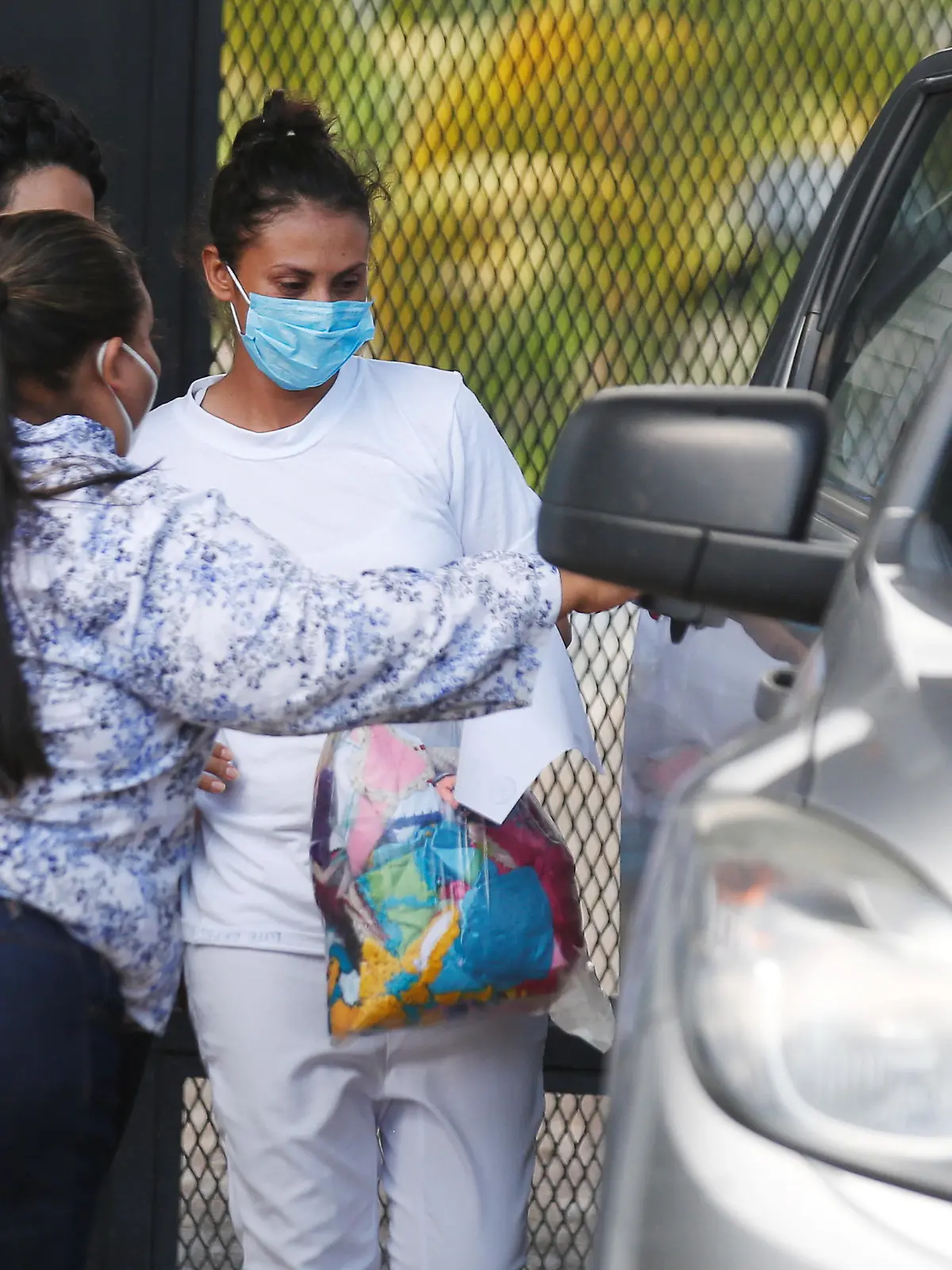 Sara Rogel, who was sentenced to 30 years in prison for a suspected abortion, is embraced by her mother as she is released from jail in Zacatecoluca, El Salvador June 7, 2021. REUTERS/Jose Cabezas