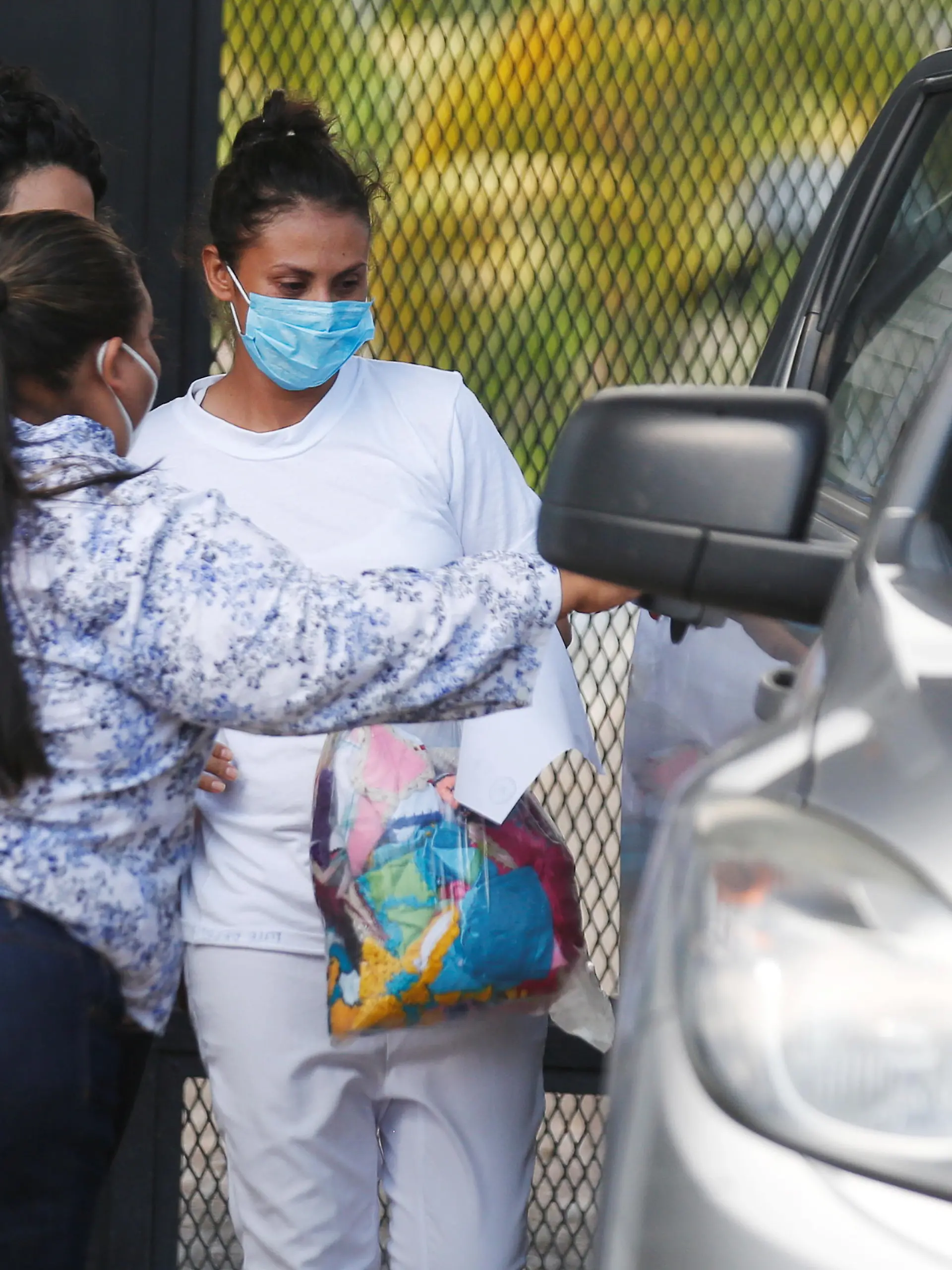 Sara Rogel, who was sentenced to 30 years in prison for a suspected abortion, is embraced by her mother as she is released from jail in Zacatecoluca, El Salvador June 7, 2021. REUTERS/Jose Cabezas