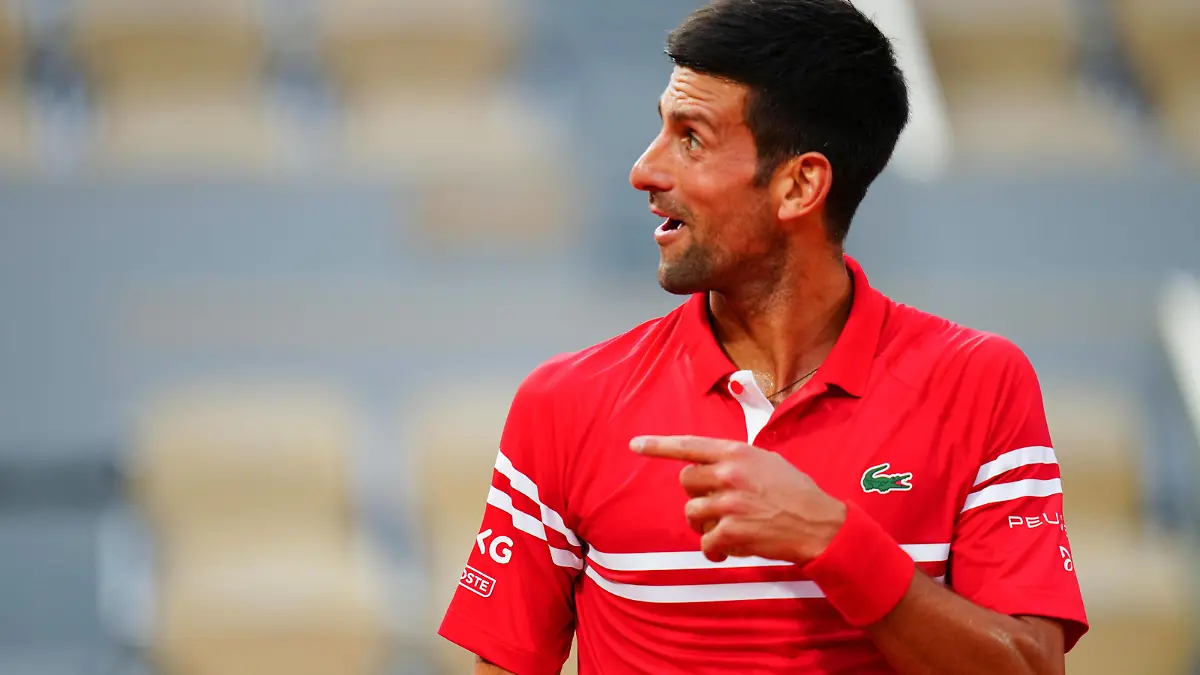 Mandatory Credit: Photo by Javier Garcia/BPI/Shutterstock 12046068la Novak Djokovic reacts to boos against him during his quarter final French Open Tennis, Day Eleven, Roland Garros, Paris, France - 09 Jun 2021 French Open Tennis, Day Eleven, Roland Garros, Paris, France - 09 Jun 2021 PUBLICATIONxINxGERxSUIxAUTXHUNxGRExMLTxCYPxROMxBULxUAExKSAxONLY Copyright: xJavierxGarcia/BPI/Shutterstockx 12046068la