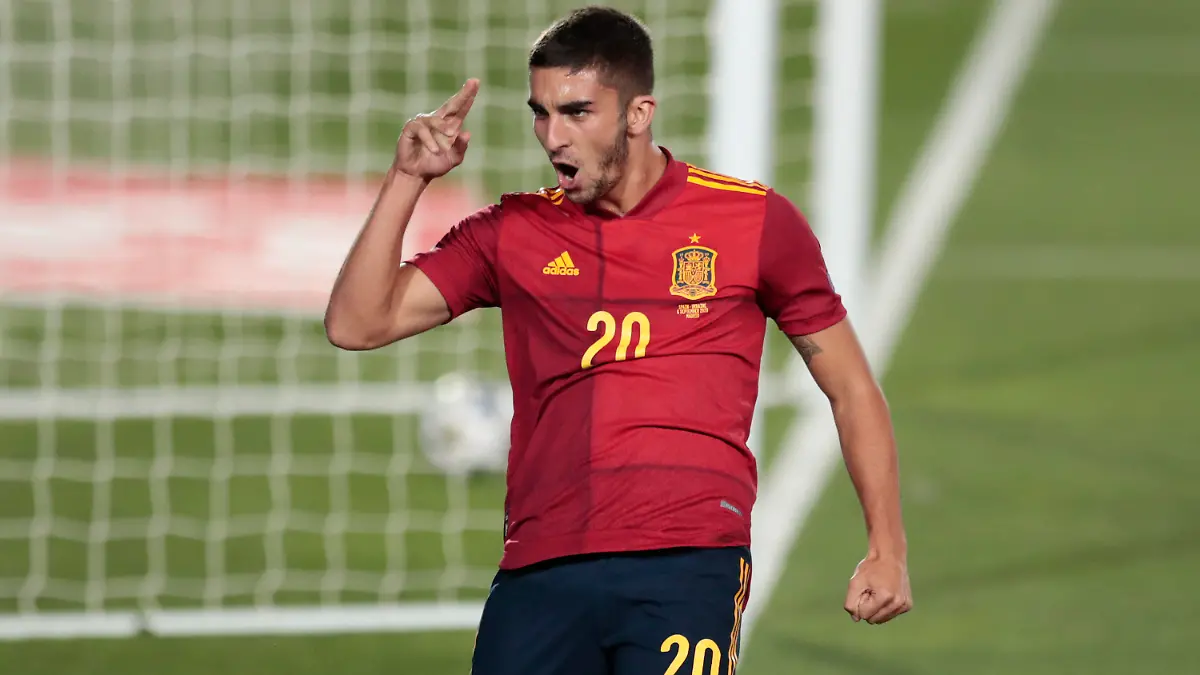 FILE - In this Sunday, Sept. 6, 2020 file photo, Spain's Ferran Torres celebrates after scoring his team's fourth goal during the UEFA Nations League soccer match between Spain and Ukraine at the Estadio Alfredo Di Stefano stadium in Madrid, Spain. Exciting talents like Phil Foden, Joao Felix and Ferran Torres are among a host of young players set to play their first major international tournaments at Euro 2020. UEFA has expanded squads from 23 players to 26 and that could encourage coaches to take a chance on more up-and-comers. (AP Photo/Bernat Armangue, File)