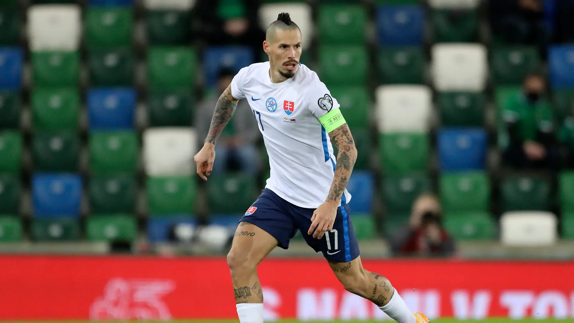 FILE - In this Thursday, Nov. 12, 2020 filer, Slovakia's Marek Hamsik looks to pass the ball during the Euro 2020 playoff semifinal soccer match between Northern Ireland and Slovakia at Windsor Park, Belfast, Northern Ireland. (AP Photo/Peter Morrison, File)