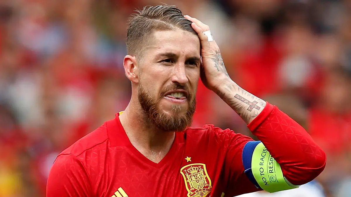FILE PHOTO: Football Soccer - Spain v Czech Republic - EURO 2016 - Group D - Stadium de Toulouse, Toulouse, France - June 13, 2016 Spain's Sergio Ramos looks dejected REUTERS/Albert Gea