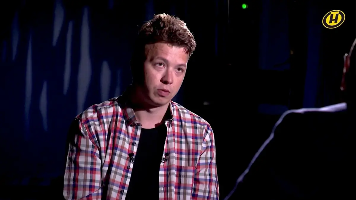 Belarusian journalist Roman Protasevich, detained last month after his flight was forced to land in Minsk, speaks during an interview with Belarusian state television, in this still image taken from undated video footage. ONT TV Channel/Handout via REUTERS TV ATTENTION EDITORS - THIS IMAGE HAS BEEN SUPPLIED BY A THIRD PARTY. NO RESALES. NO ARCHIVES. MANDATORY CREDIT. PICTURE WATERMARKED AT SOURCE.