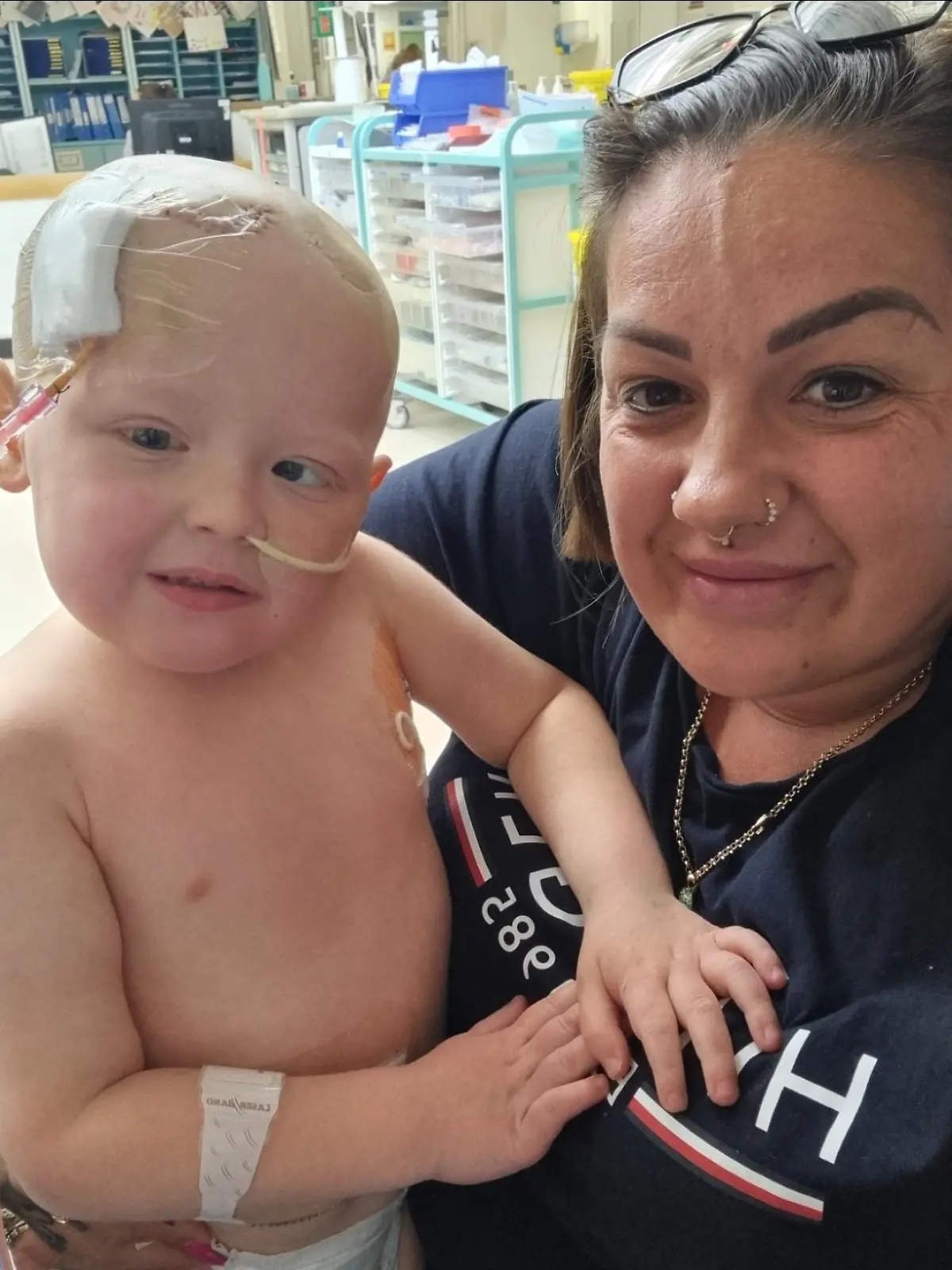 Story from Jam Press (Clumsy Cancer)

Pictured: Keiley with her son, Jett.

Mum told son had viral infection by doctors devastated after symptoms turn out to be brain tumour – after SEVEN visits to A&E

A mother is warning fellow parents to watch out for unusual health symptoms after claiming doctors said her six-year-old son’s cancer was “viral infection”.

Keiley Ebbs first noticed something was wrong with her little boy, Jett, when he began complaining of pain in his arms and legs, experienced morning sickness and became clumsy, randomly walking into things.

She was allegedly told by medical professionals that the symptoms were a sign of a viral infection.

Sensing in her gut that there was more to her son’s behaviour and after seven visits to A&E, the mum pushed for further investigation.

A devastating scan revealed a brain tumour travelling down his spine.

“They kept saying it was a viral infection, and to take him home and give him over-the-counter medication,” The 38-year-old from Lincolnshire told http://NeedToKnow.co.uk.

“I had it in my head that he had a brain tumour, I’d seen the symptoms before in my job as a carer.

“I was frustrated that the doctors kept saying the same thing and didn’t seem to listen to me.

“I feel like they thought I was exaggerating but I knew there was something seriously wrong with him.”

Returning to A&E for the seventh time on 13 December, doctors agreed to give Jett a CT scan and the results were horrifying.

He was diagnosed with a brain tumour and was immediately rushed to Sheffield hospital where he underwent a 10-hour surgery to remove the mass.

She said: “It’s so hard to even explain, it was so quick.

“They said ‘Jett has a brain tumour, we are blue-lighting you to Sheffield’.

“I can remember sitting in the ambulance ride.

“Not knowing what was going on, he was so excited to be in an ambulance and my journey was a complete blur, it was so bizarre.

“The nurse kept checkin